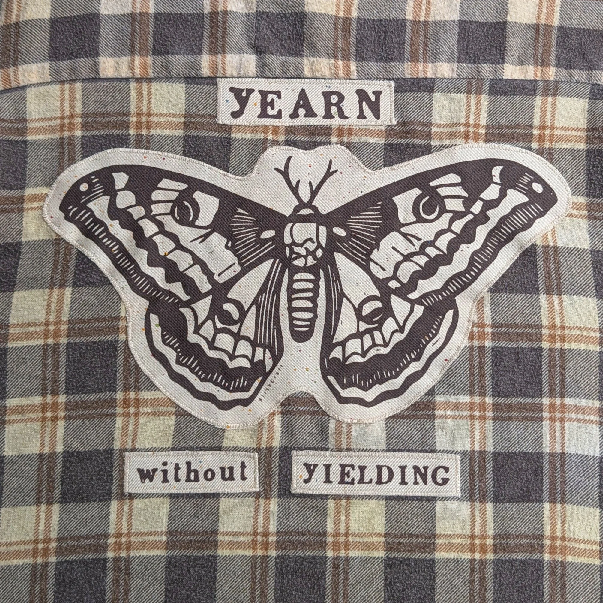Yearn flannel. 
Original design and saying.