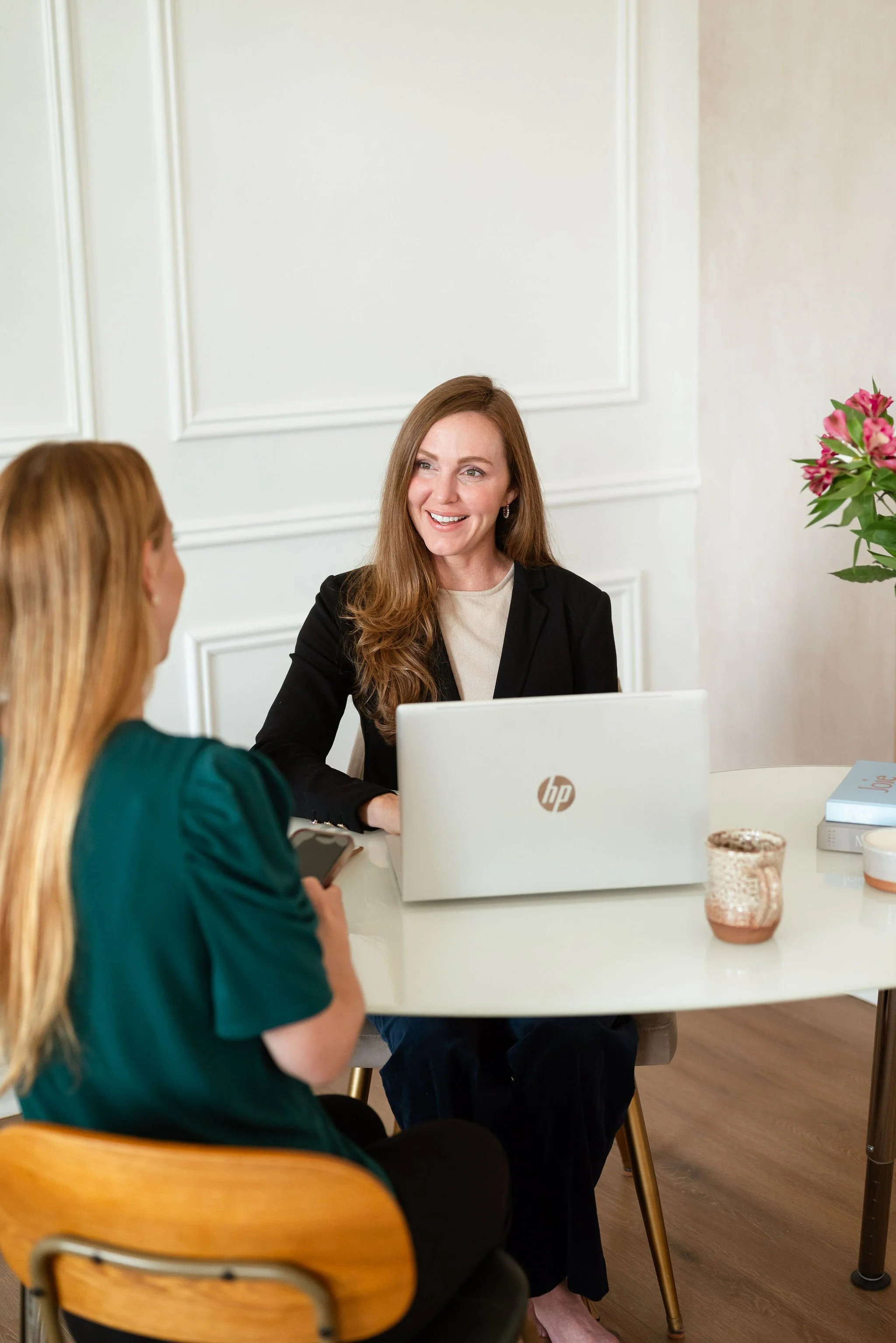 Katie Hardie CPA meeting with a small business client to discuss accounting services