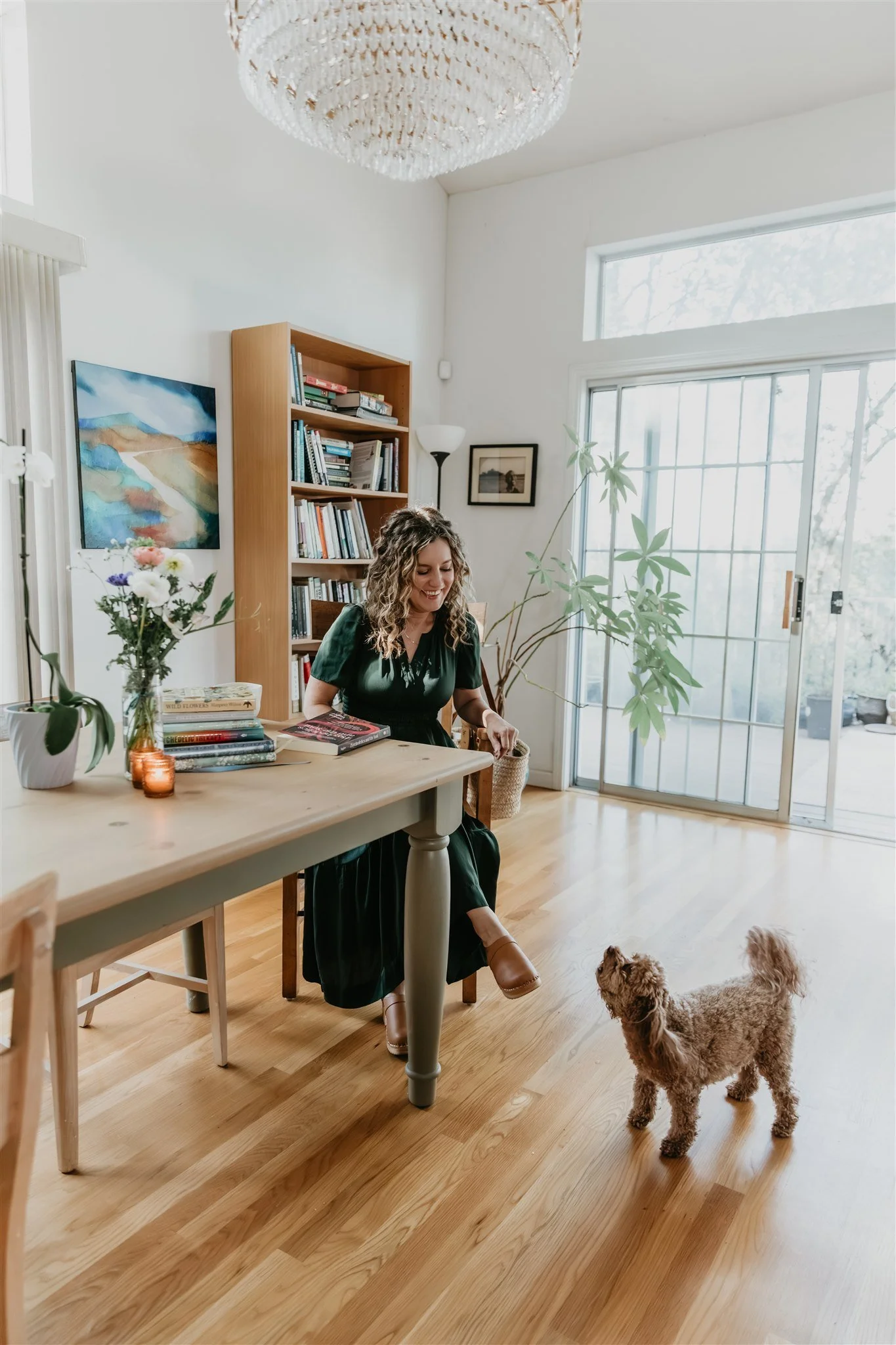Rachael Courtier writing in a notebook as an internal family system therapist in California