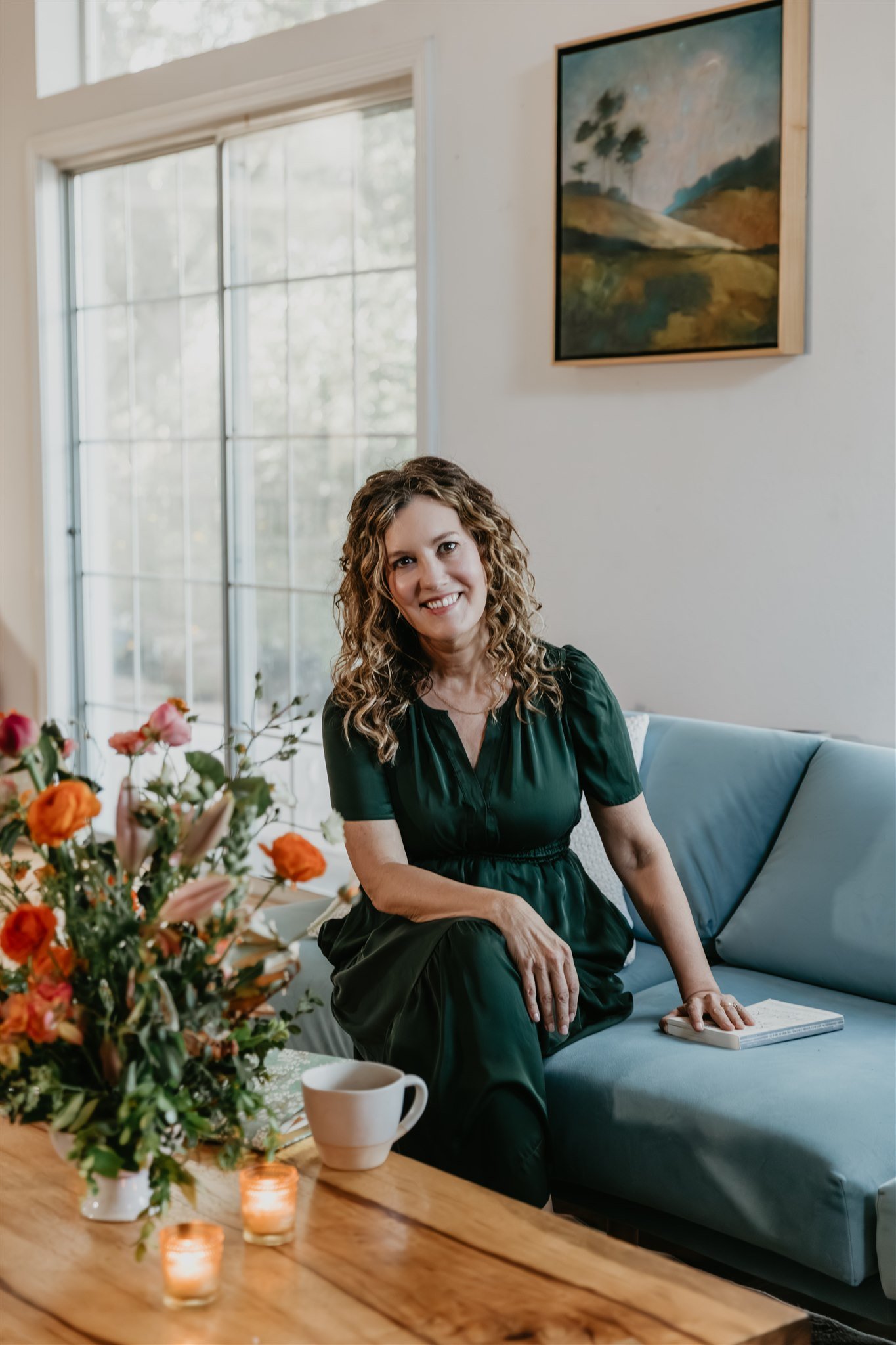 Rachael Courtier, attachment based therapist, seated in her calm therapy office