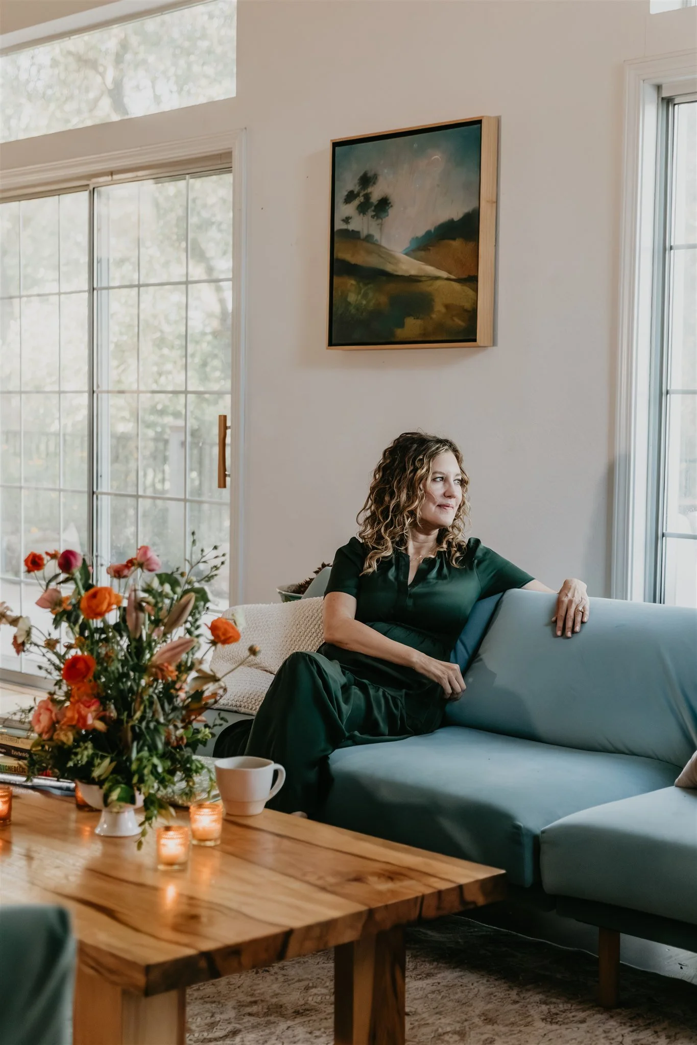 Rachael Courtier, trauma therapist for EMDR and complex trauma, seated in her office