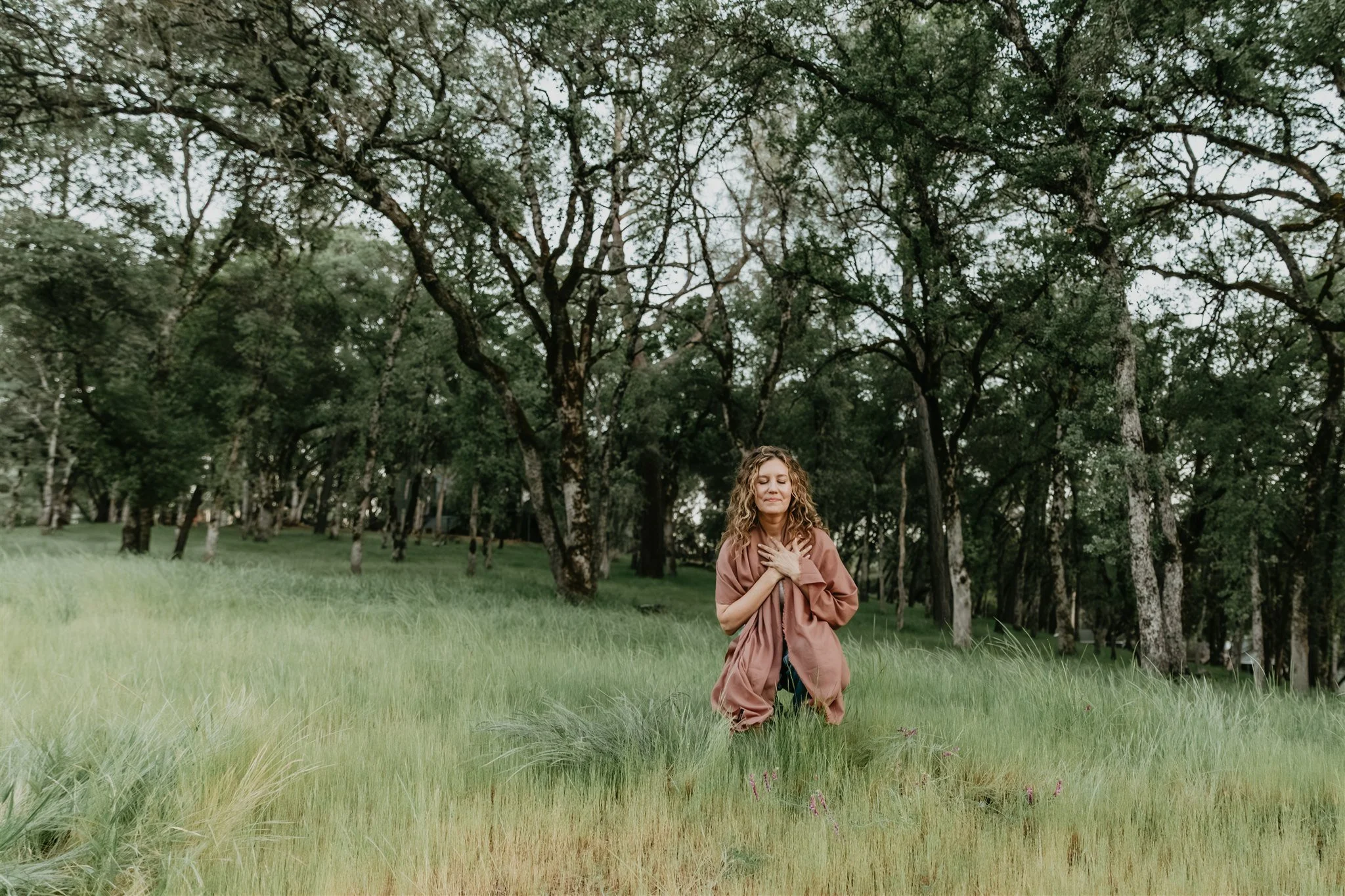 Rachael Courtier in nature offering somatic therapy for complex trauma support