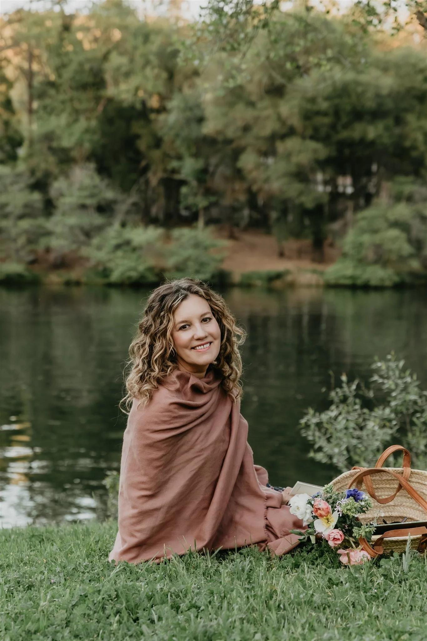 Rachael Courtier by the lake supporting neurodivergent relationships and emotional healing