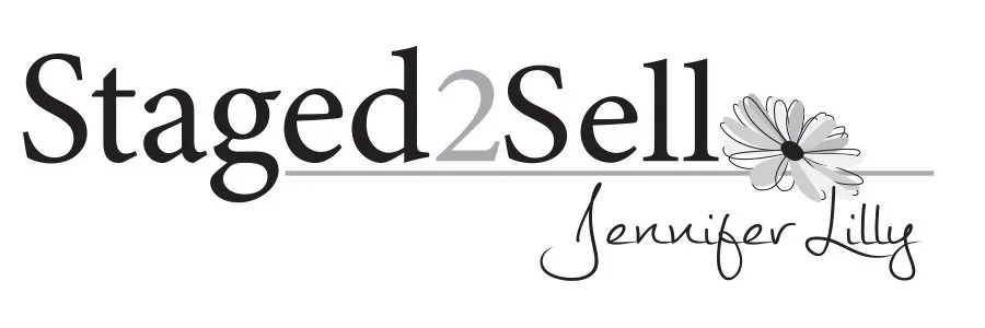 Logo for 'Staged2Sell' with the name 'Jennifer Lilly' and a daisy flower design.