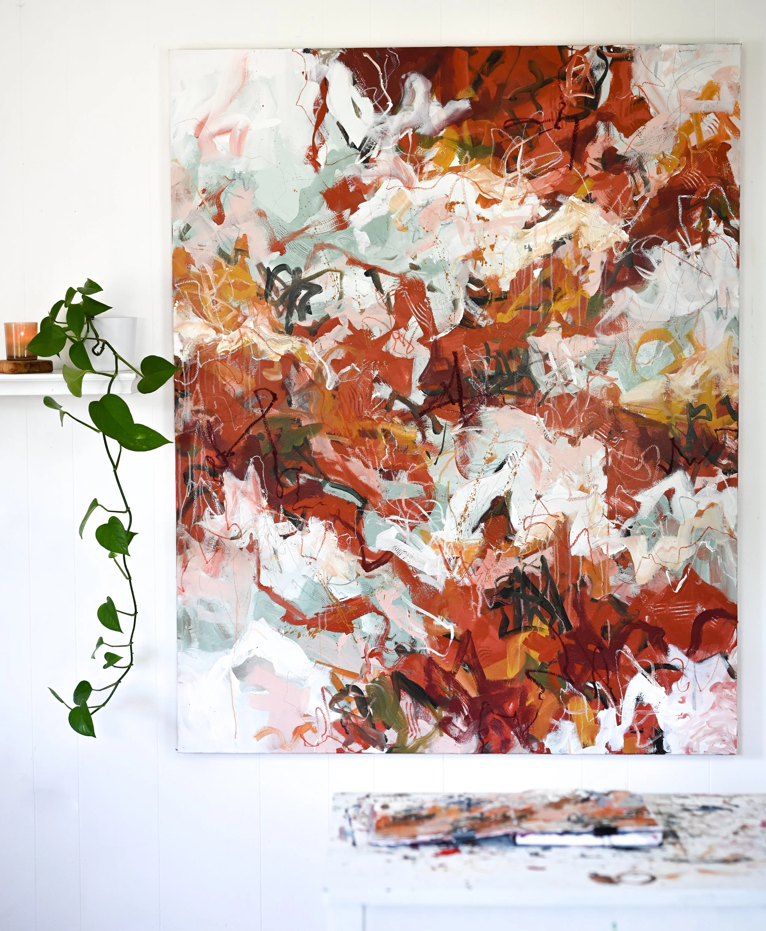 large abstract painting in living room