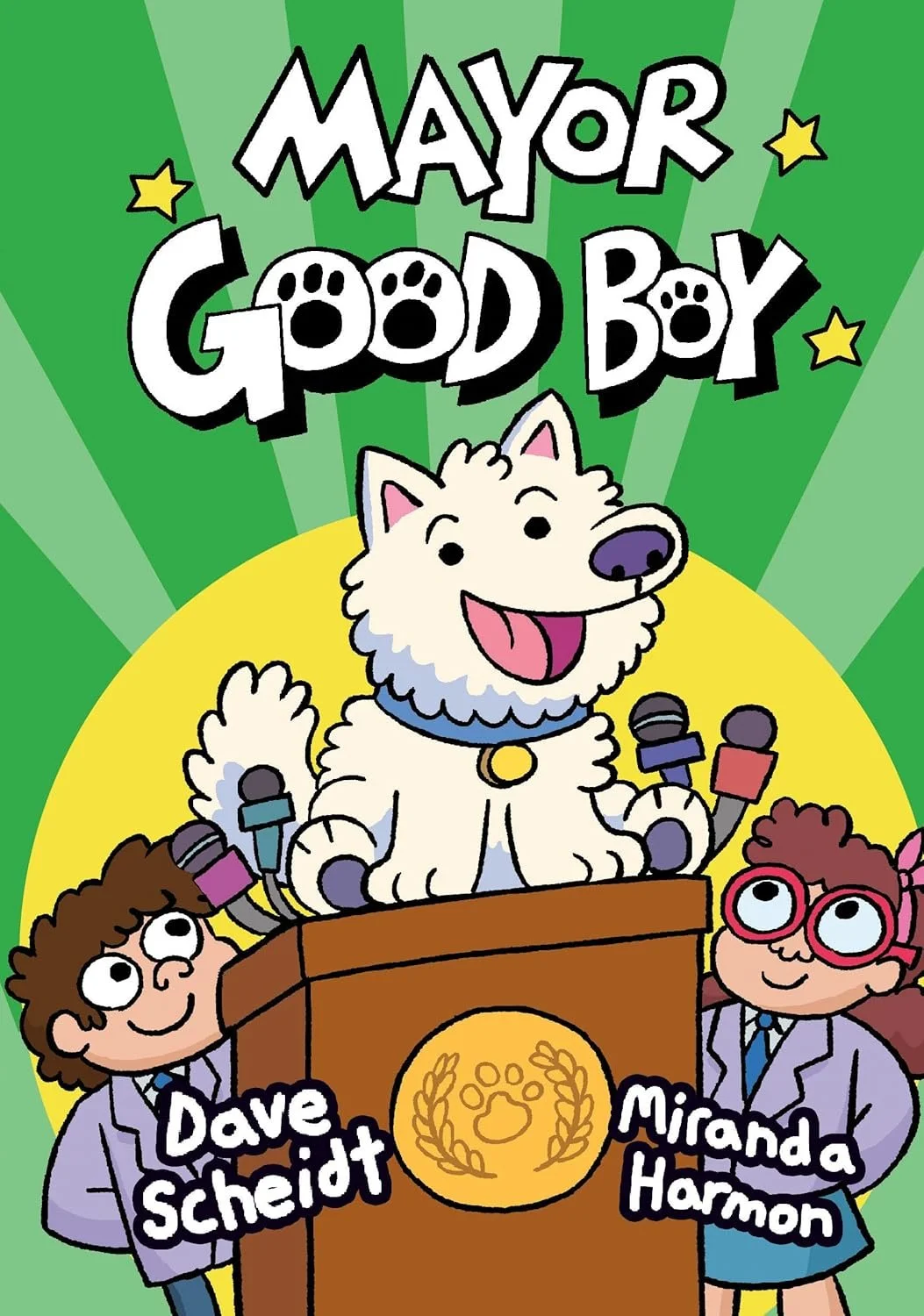 Front cover illustration of the children's graphic novel Mayor Goodboy by Dave Scheidt and Miranda Harmon, featuring a cheerful dog behind a mayoral podium
