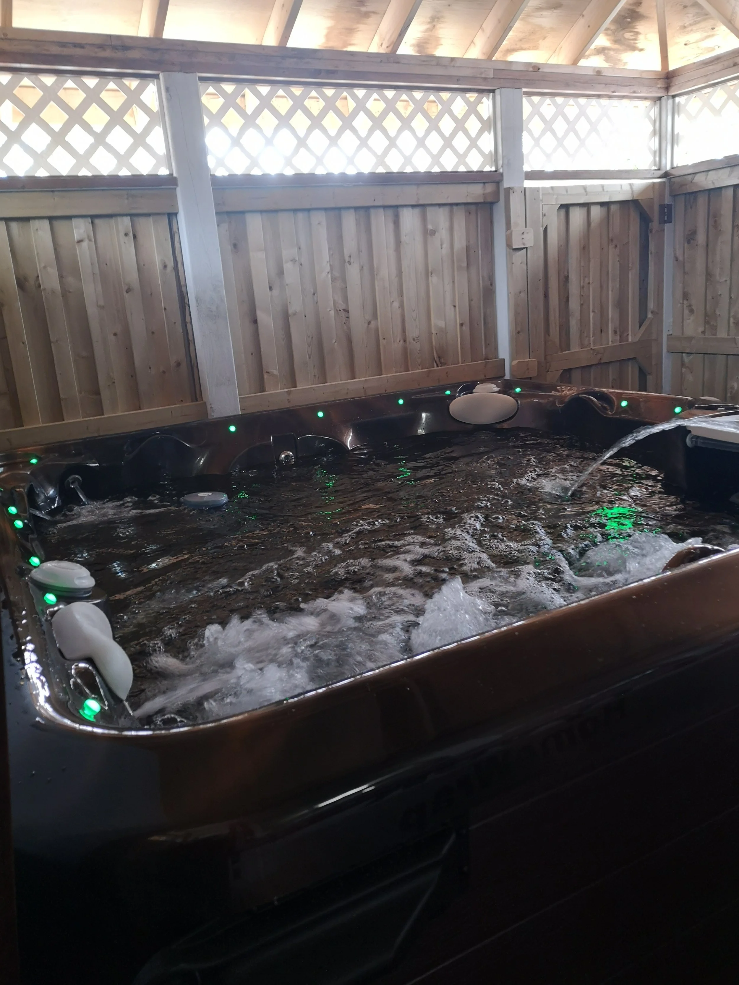 King bed guest suite with hot tub at Seaport Inn Newfoundland