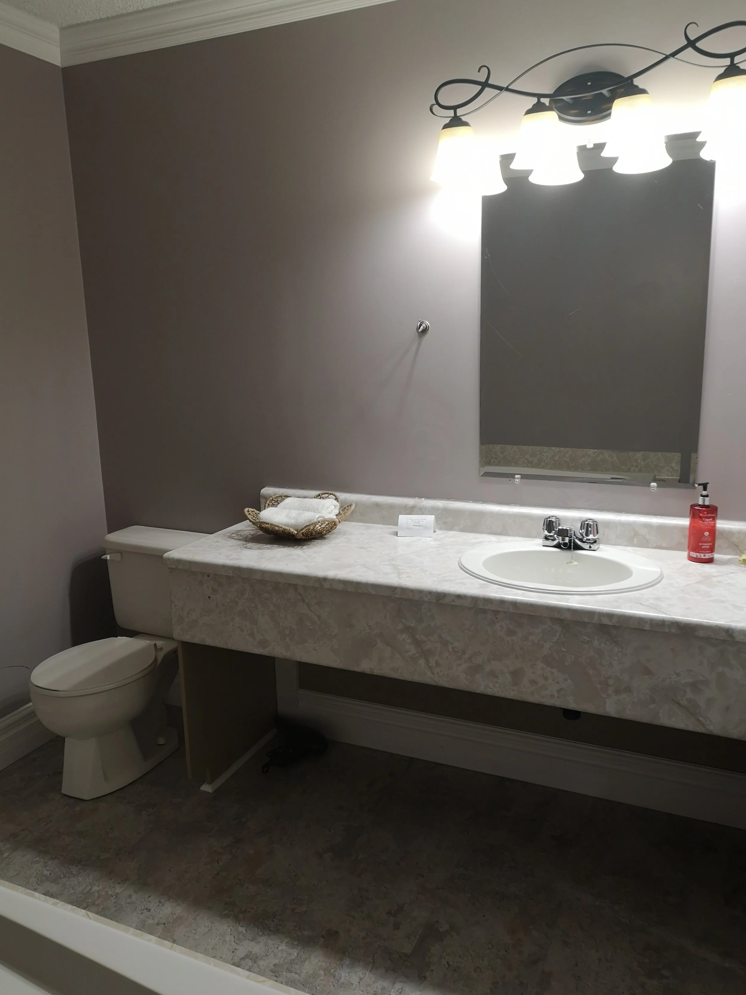 King bed guest suite with hot tub at Seaport Inn Newfoundland