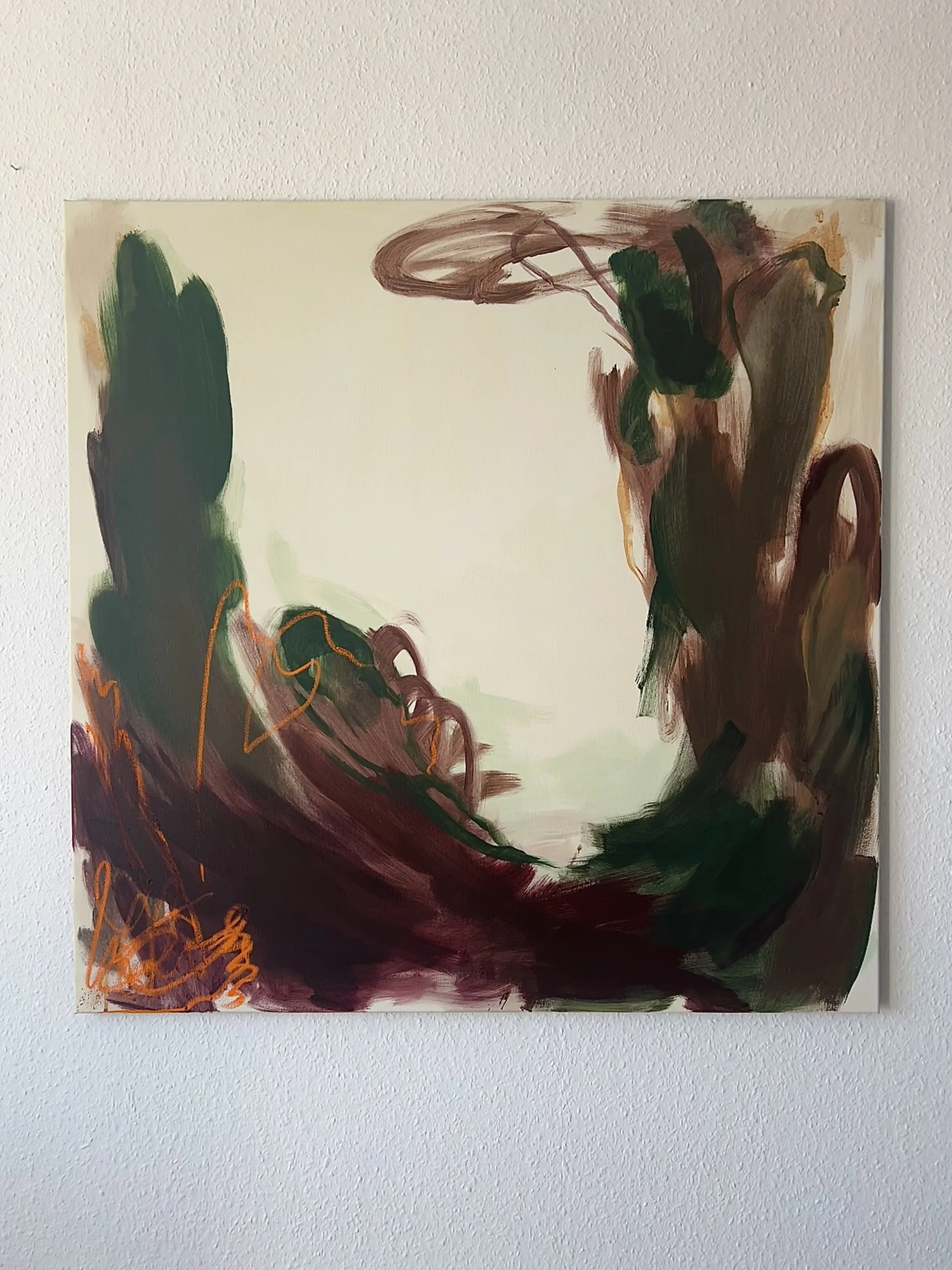 Abstract expressionist painting with swirling brushstrokes in dark green, brown, orange, and beige on a white gallery wall.