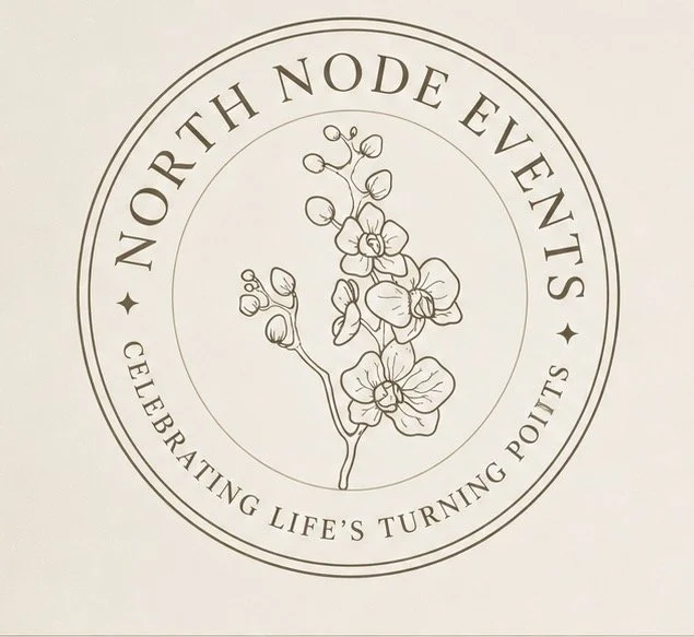 Logo of North Node Events featuring a line drawing of a flowering plant inside a circle, with the text 'North Node Events' and 'Celebrating Life's Turning Points' around the circle.
