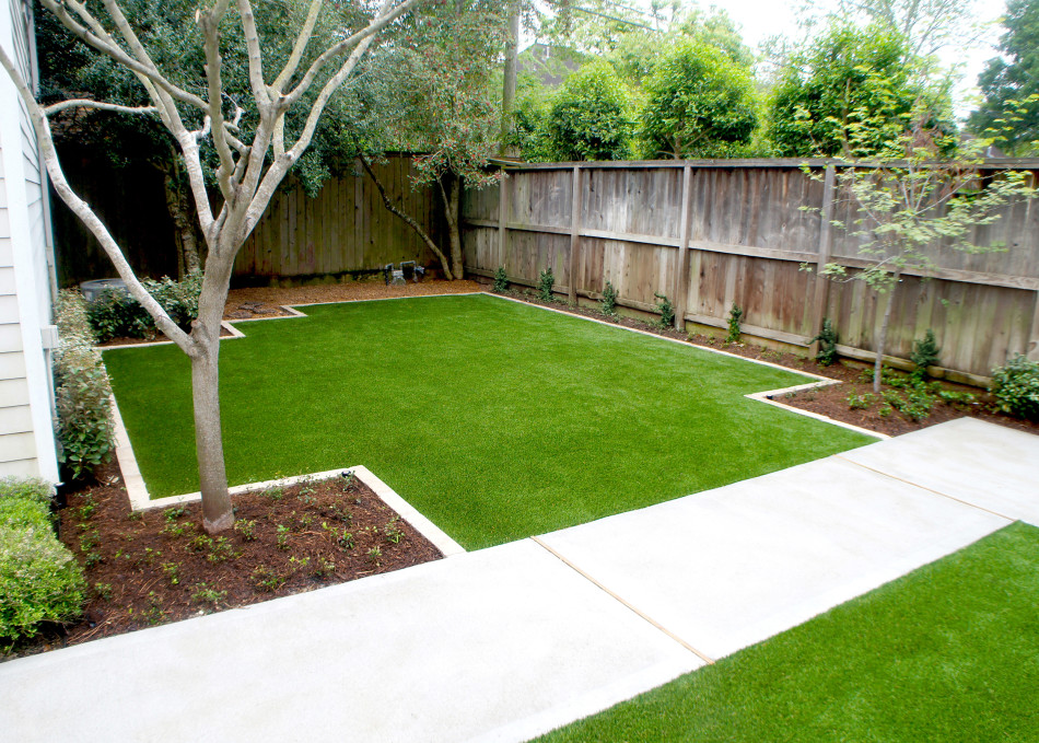 Fig ivy will grow to cover the fence adding a green, textured backdrop to a shady dining area.