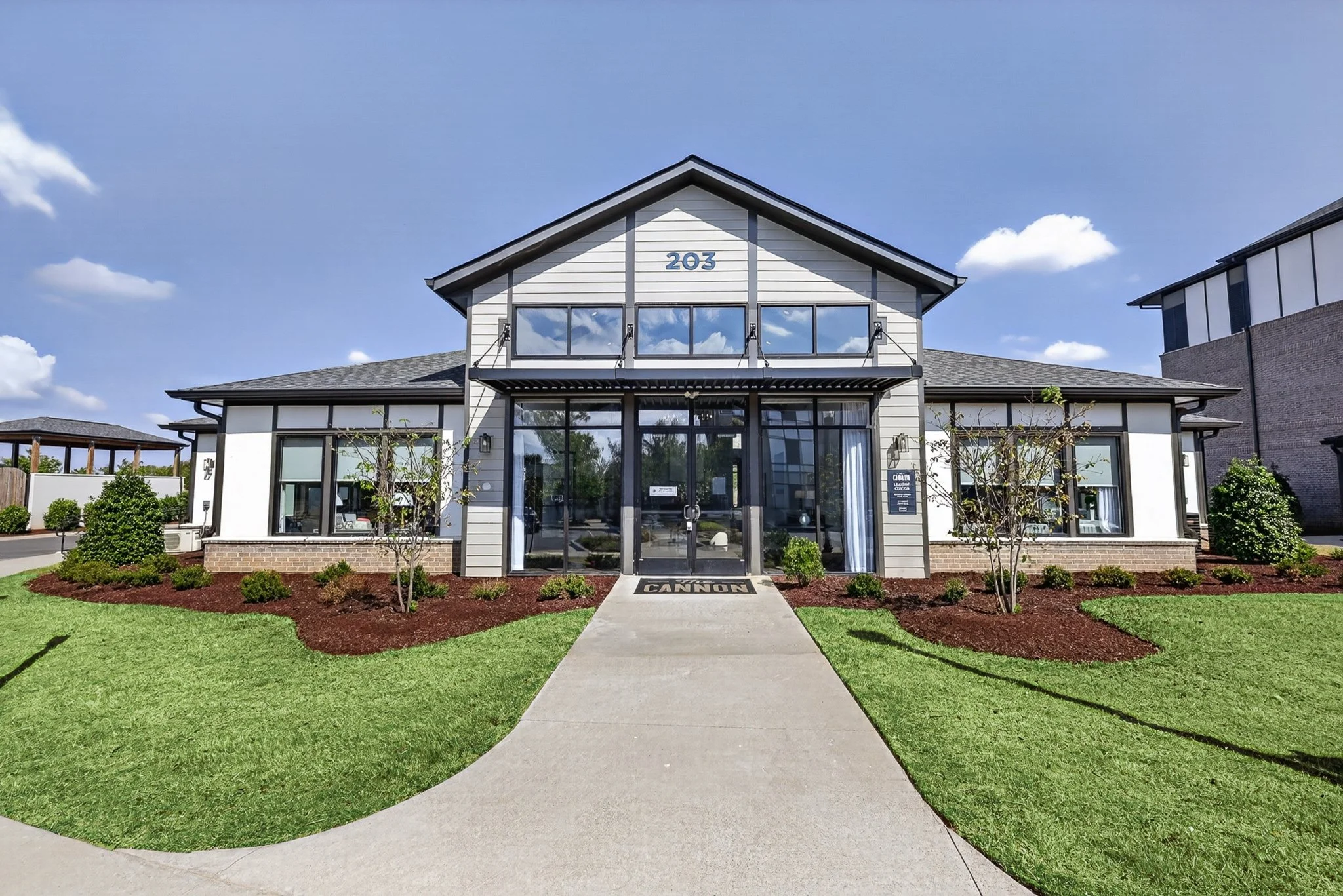 203-clubhouse_grass-landscaping-concrete-fixed.jpg