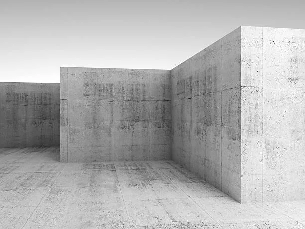 Concrete wall and ground in a minimalist, modern architectural setting.