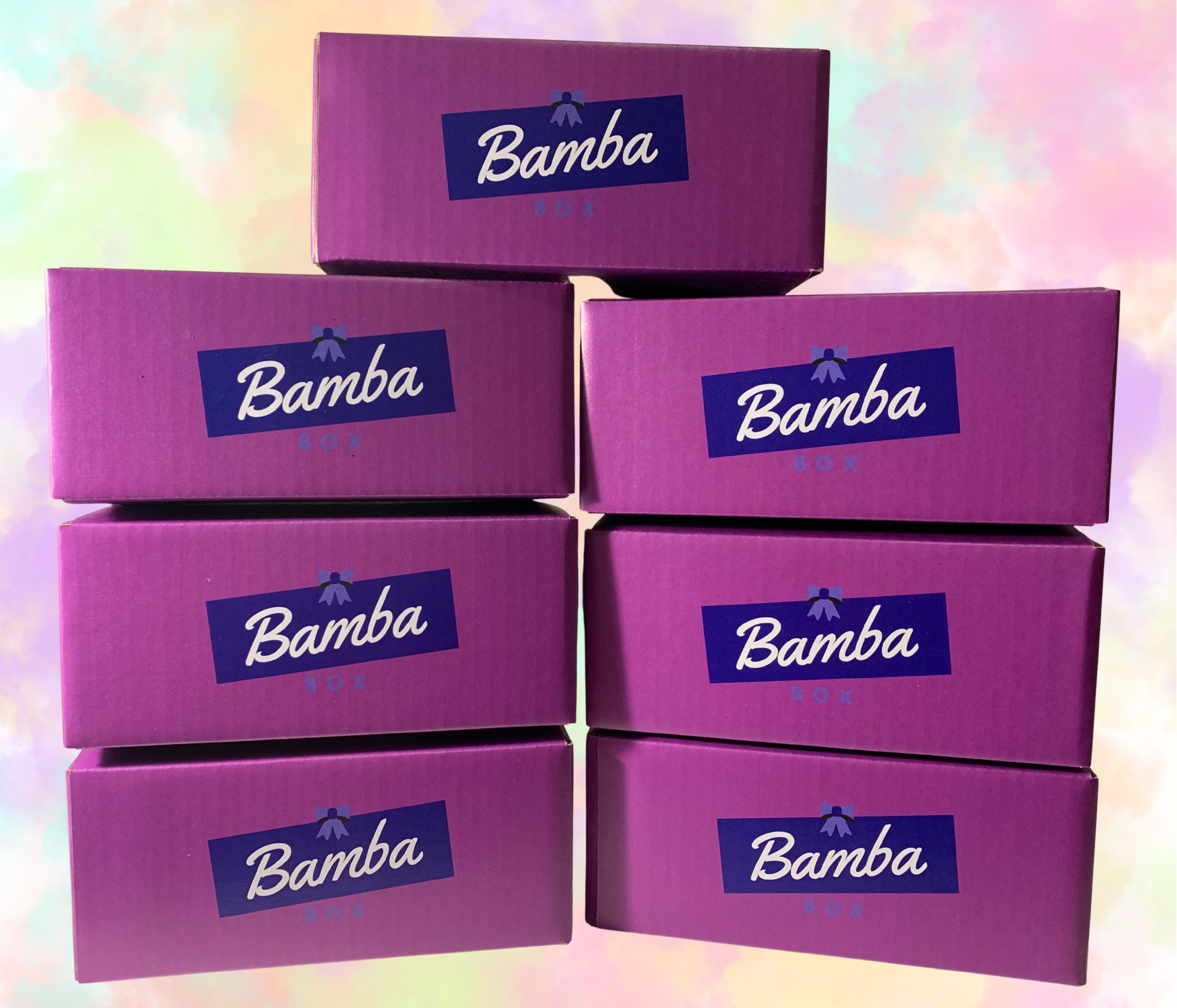 Stacked purple boxes labeled 'Bamba Box' against a pastel tie-dye background.
