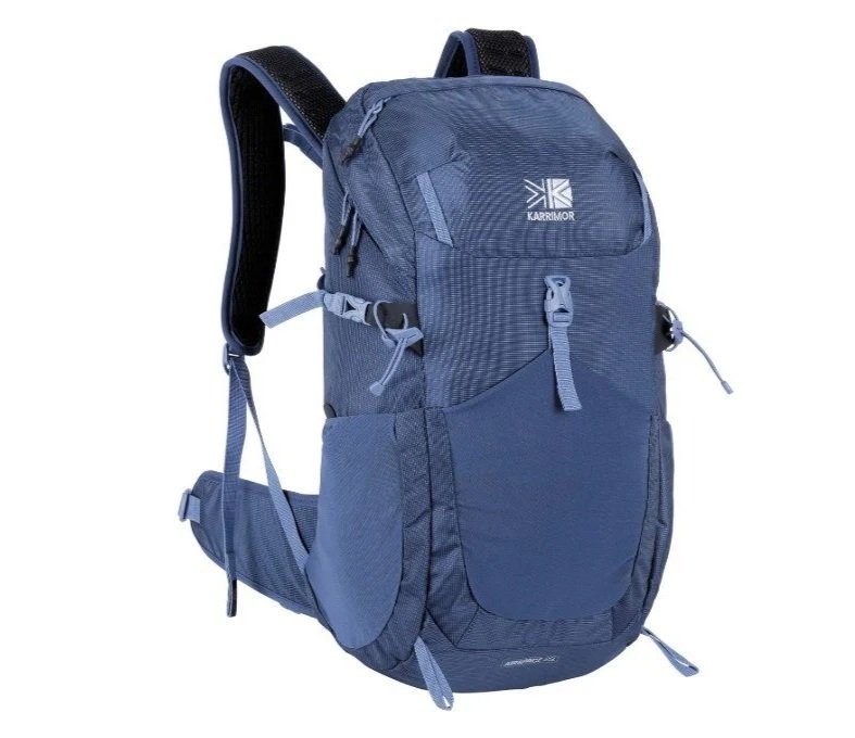 A blue Karrimor hiking backpack with multiple compartments and adjustable straps, designed for outdoor activities.