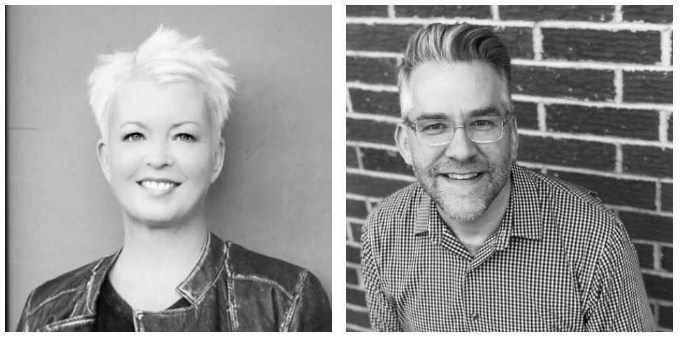Black-and-white side-by-side portrait of a woman with short, spiky blonde hair smiling on the left and a man with short hair, beard, glasses, and checkered shirt smiling against a brick wall on the right.