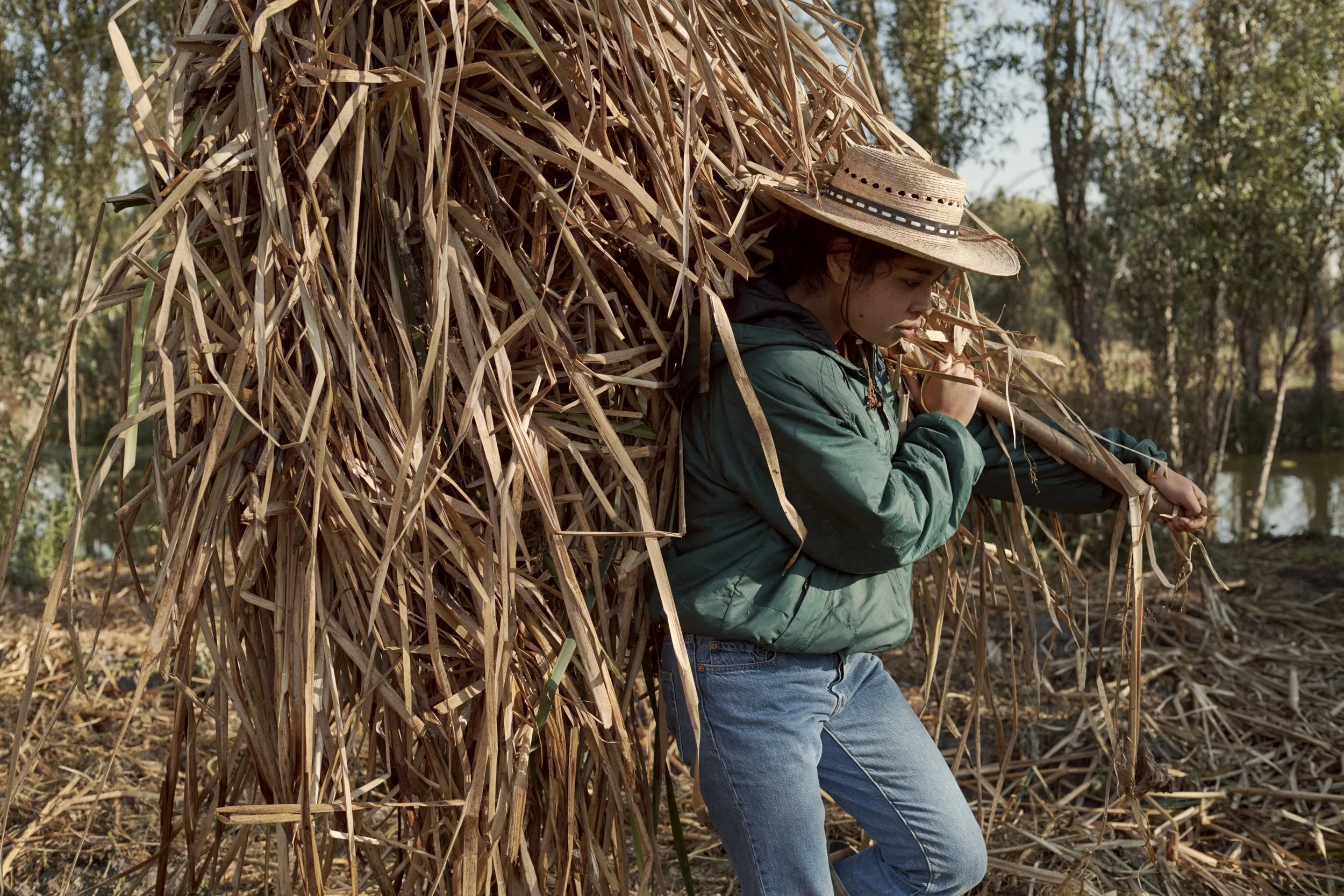 Mixtli Barrera Fernandez working on her family’s chinampa. “The Chinampería and how it was created is precisely this close relationship between
human beings and their environment. It's from observing what surrounds us that the
Chinampería is built. A
