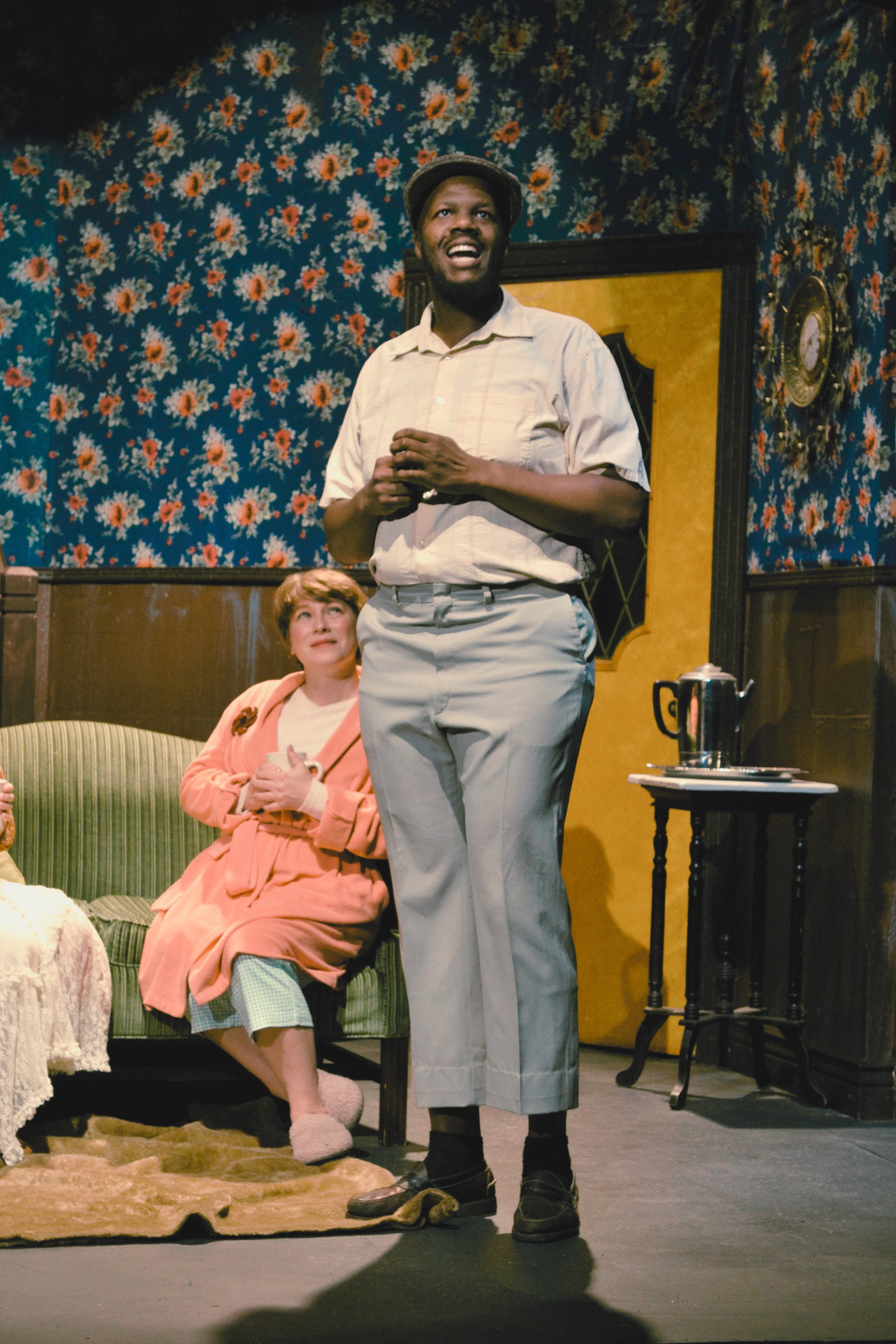 Slyvan Arthur Brooks, played by Jeffrey Charles Fleming, stands sharing his story