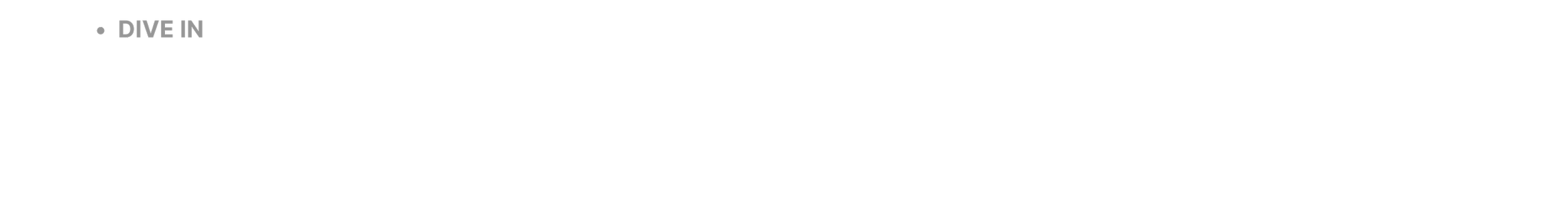 Close-up of a black surface with white text that reads 'DIVE IN'.