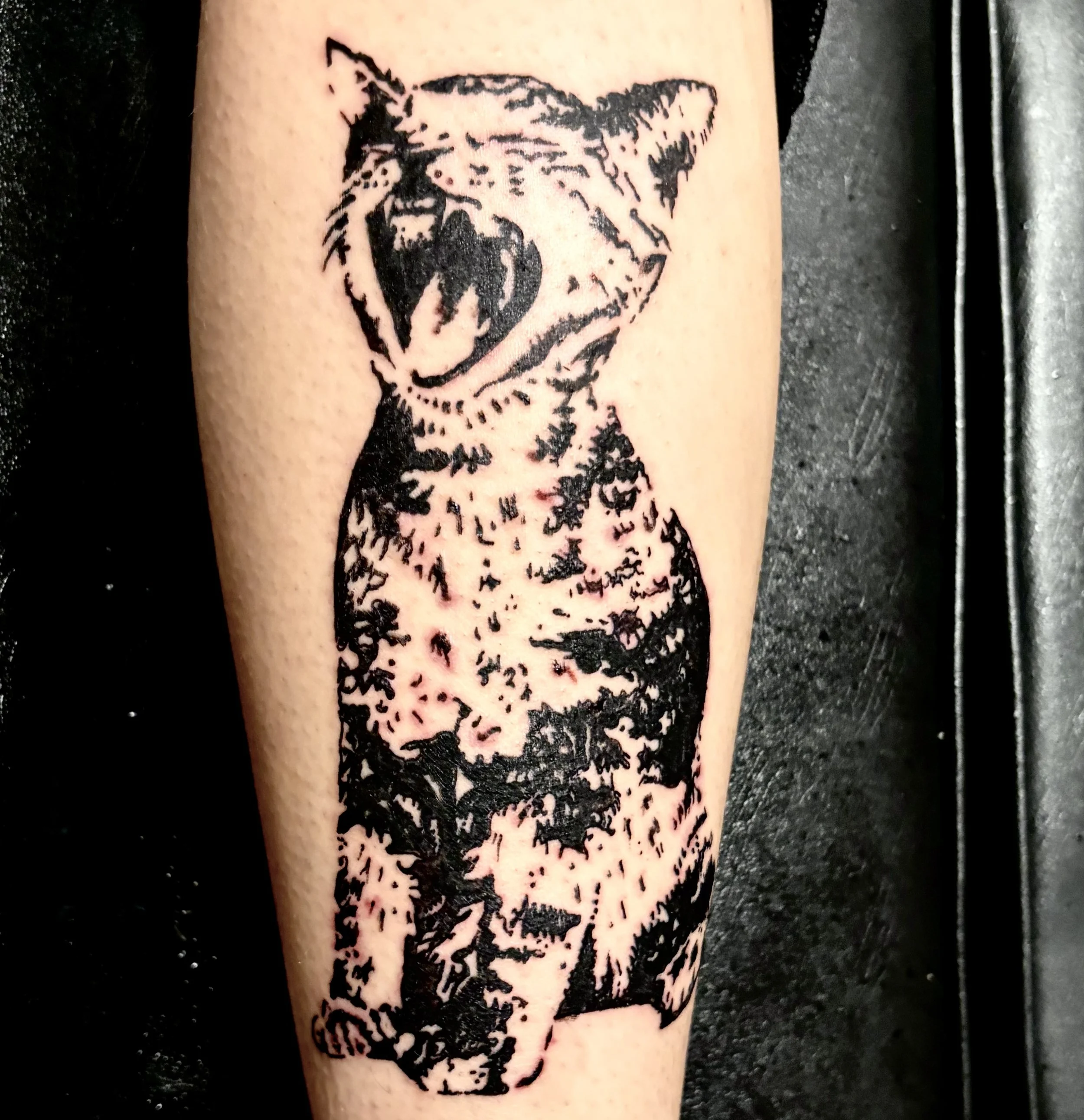 Black and white tattoo of a dog with a good nose.