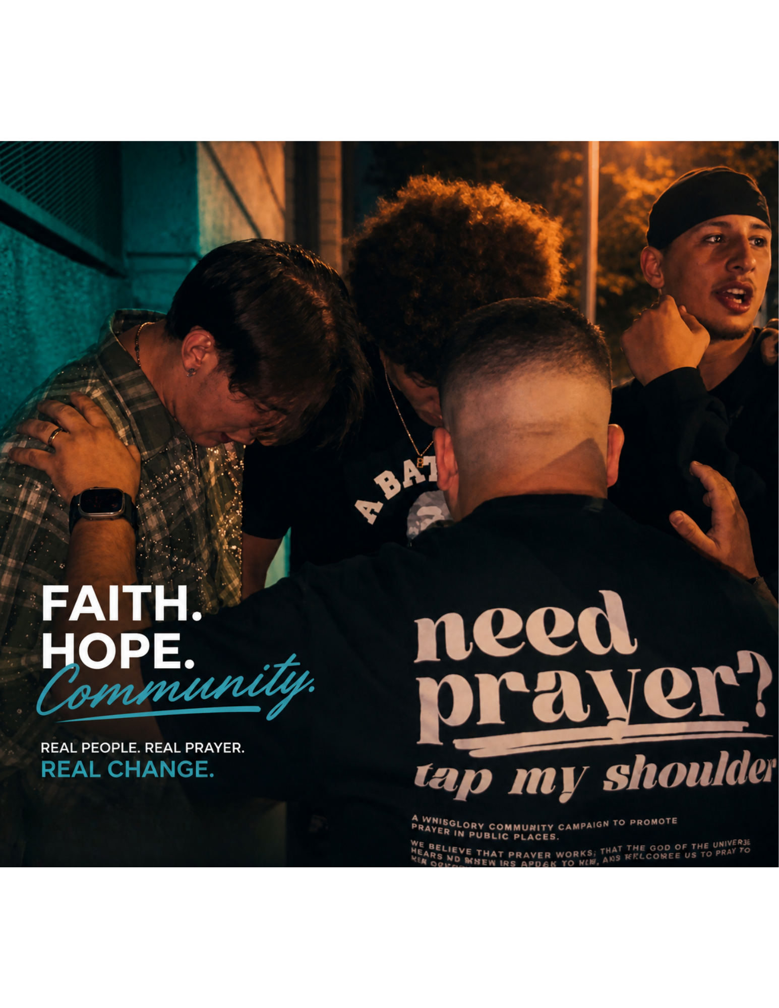 Group of people praying together outdoors at night with warm lighting, heads bowed and hands on shoulders, embracing and supporting each other.