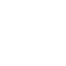 A black and white outline of a four-piece puzzle piece.