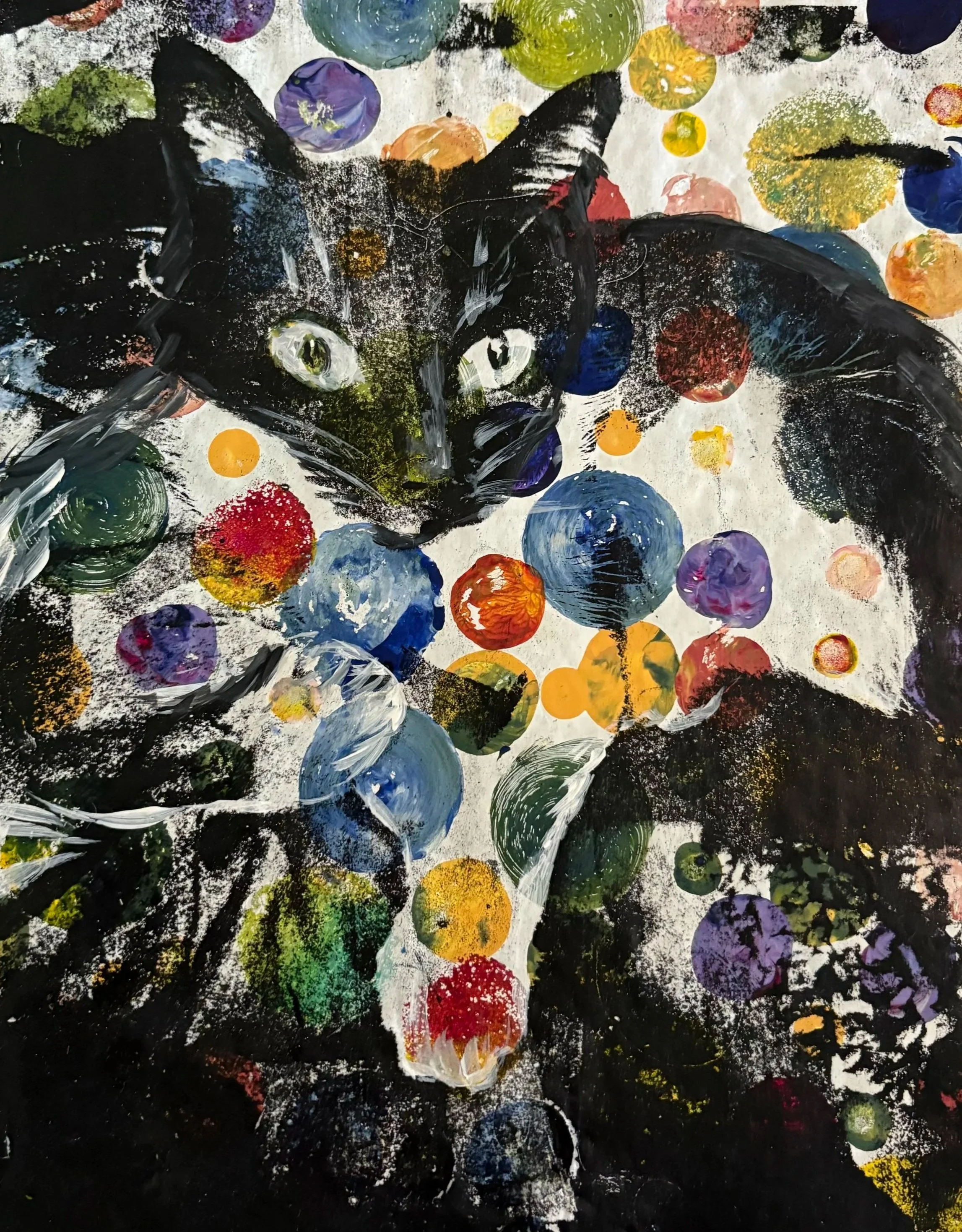 Abstract painting featuring a black cat against a background filled with colorful circles and splashes of white, yellow, red, blue, purple, and green paint.