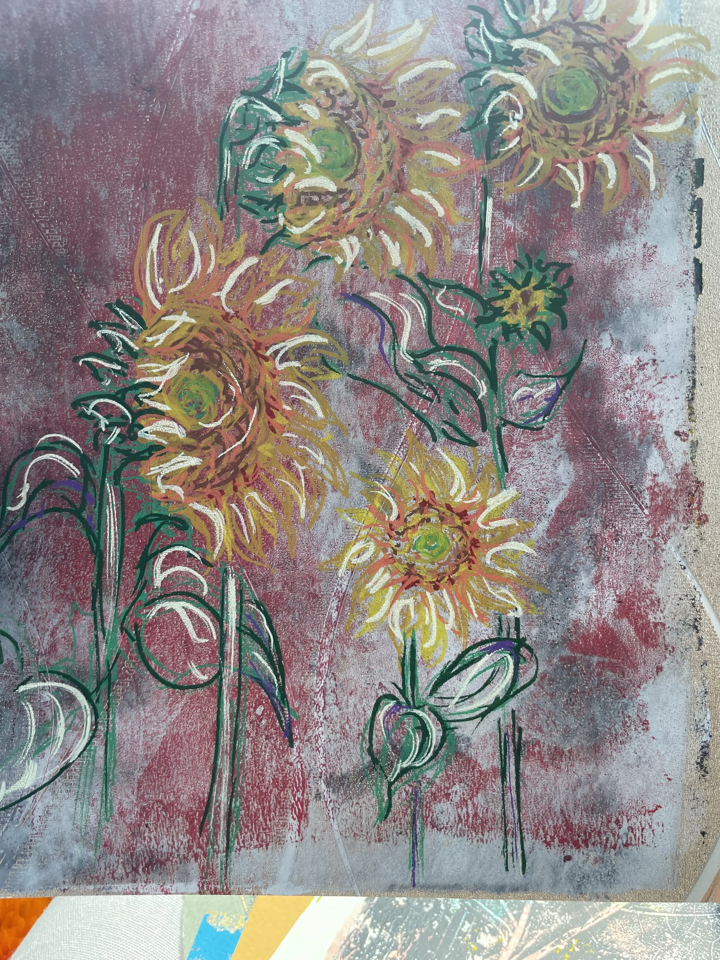 A colorful childlike drawing of several sunflowers with yellow, orange, green, and purple colors, set against a pink and white textured background.