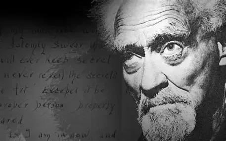 A black and white photo of Albert Einstein with a serious expression, partially covering handwritten notes in background.