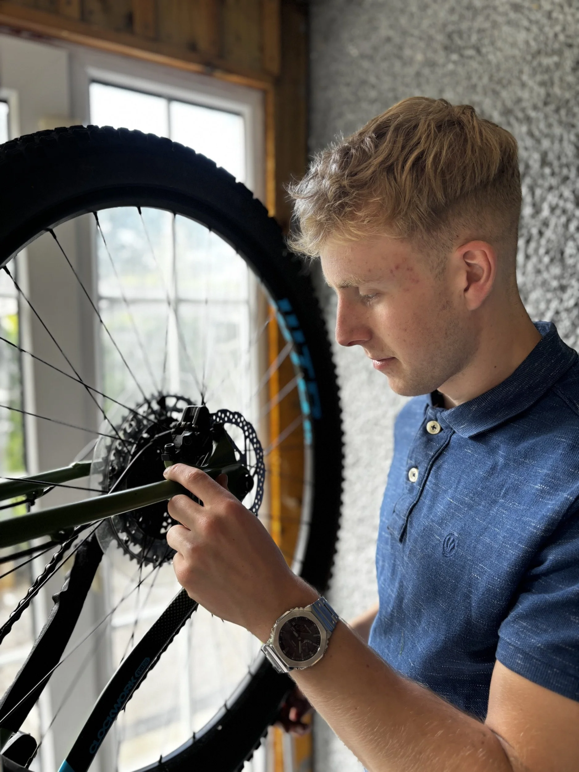 Mountain bike brake inspection at Canny Cycle Services