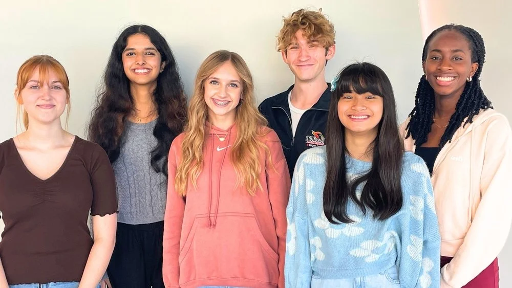 students posing and smiling who are going to solo and ensemble state