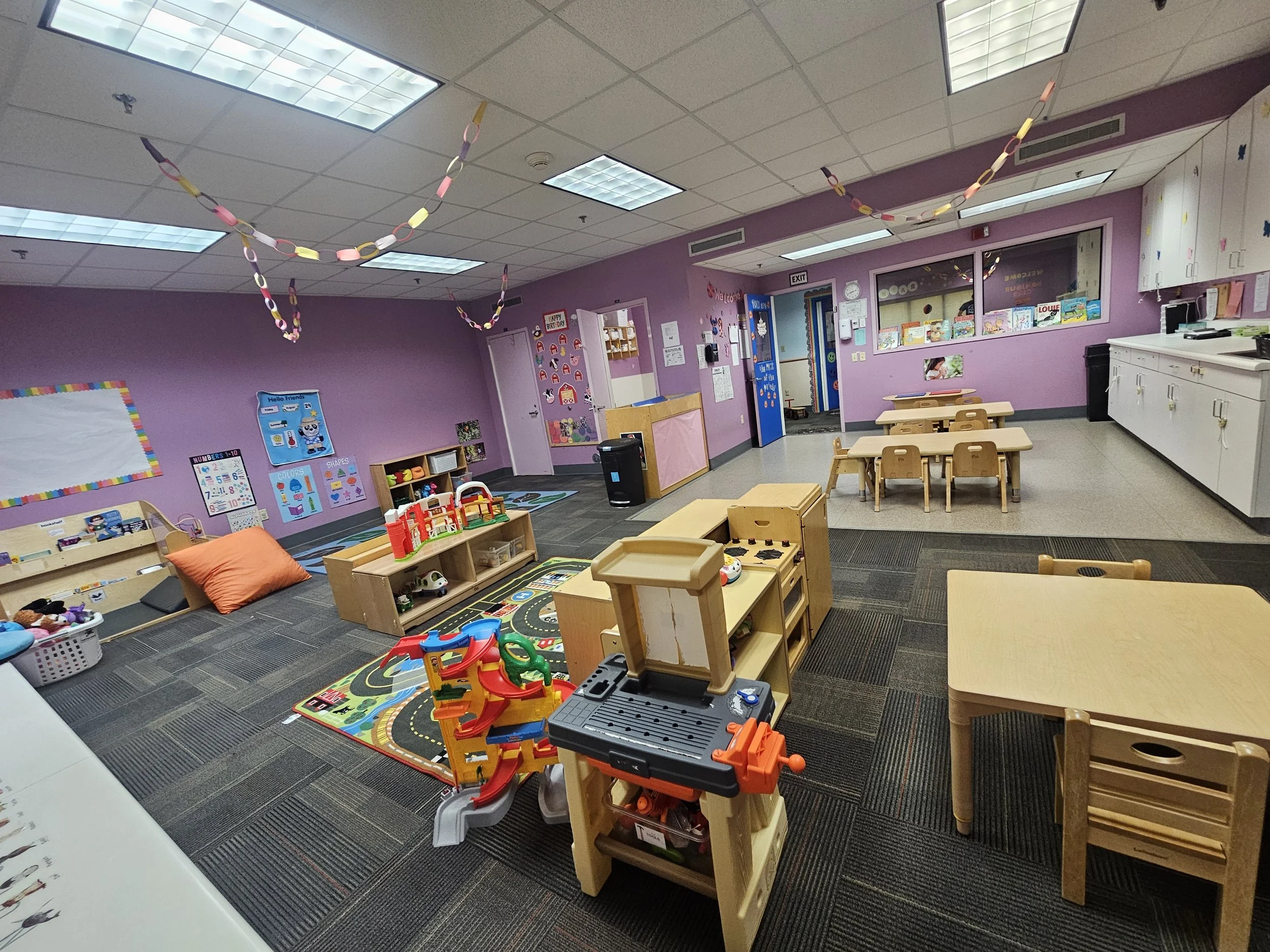 Rainbow Room: a classroom for some older 1 year olds, and younger 2 year olds