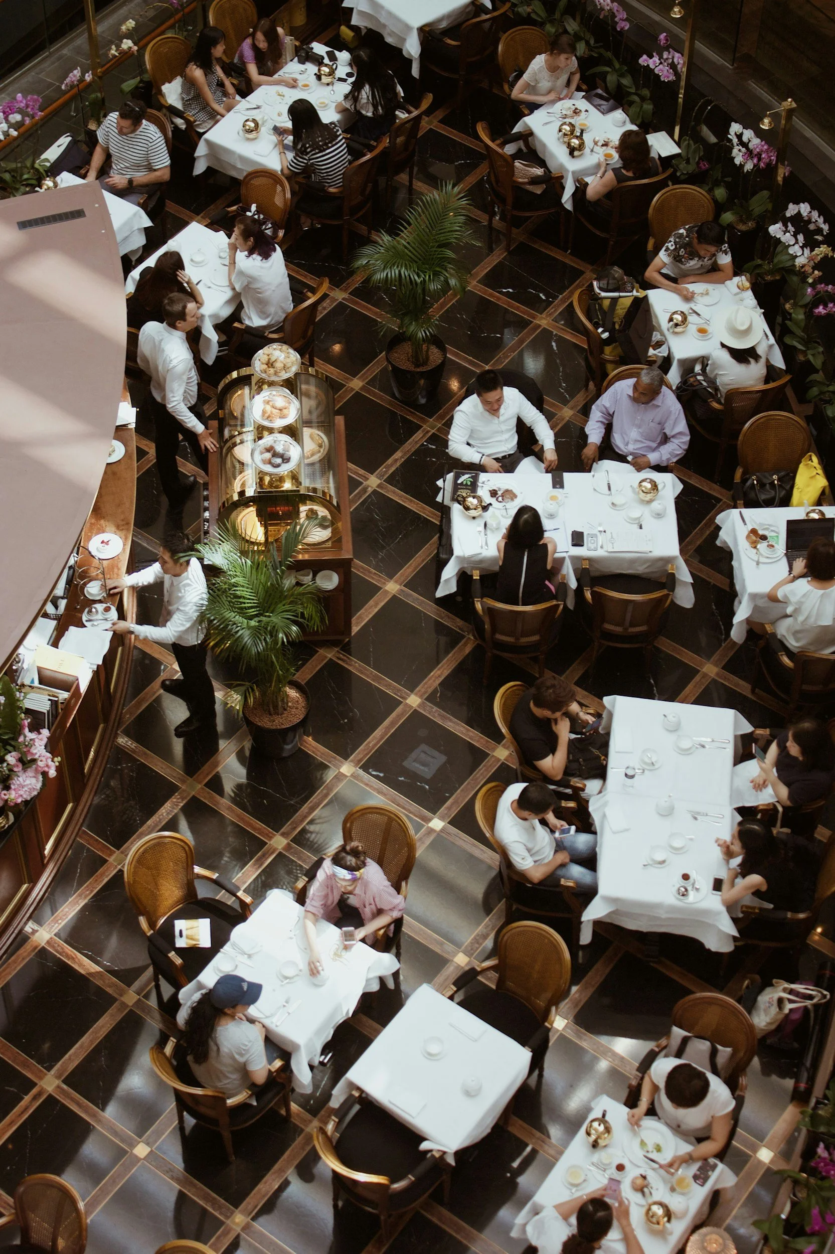 Busy restaurant dining room representing the hospitality businesses served by Prime Cost Partners.