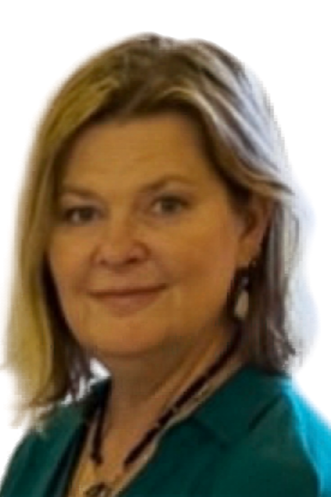 A woman with shoulder-length light brown hair, wearing a teal blazer and a necklace, smiling