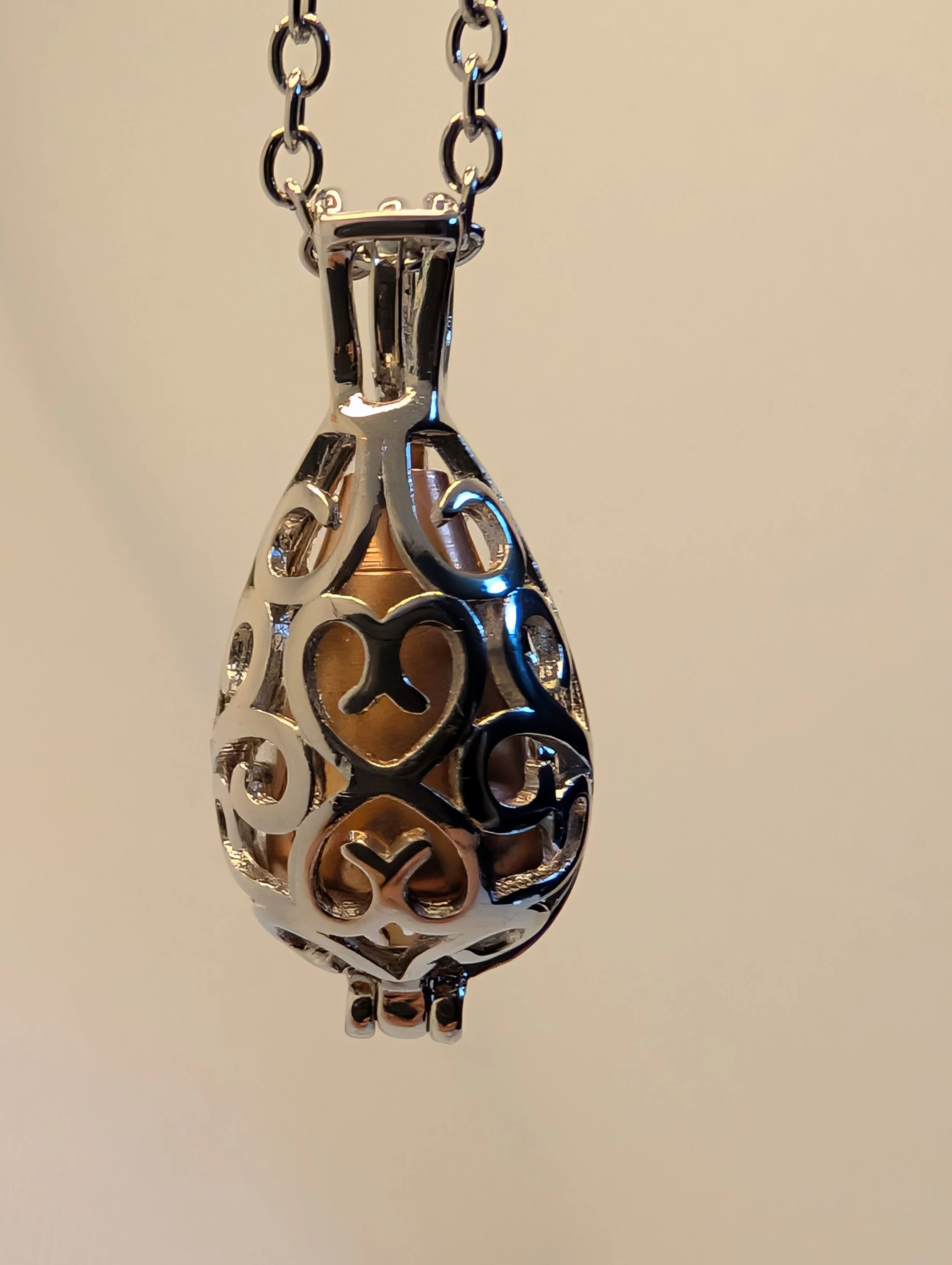 Filigree memorial pendant
