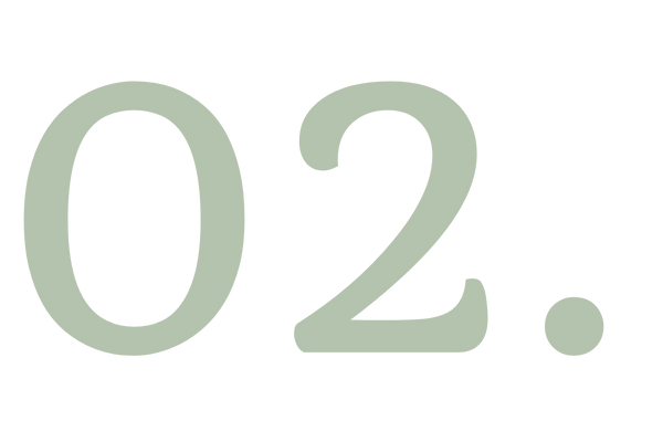 Close-up of the number '02' in light green on a black background.