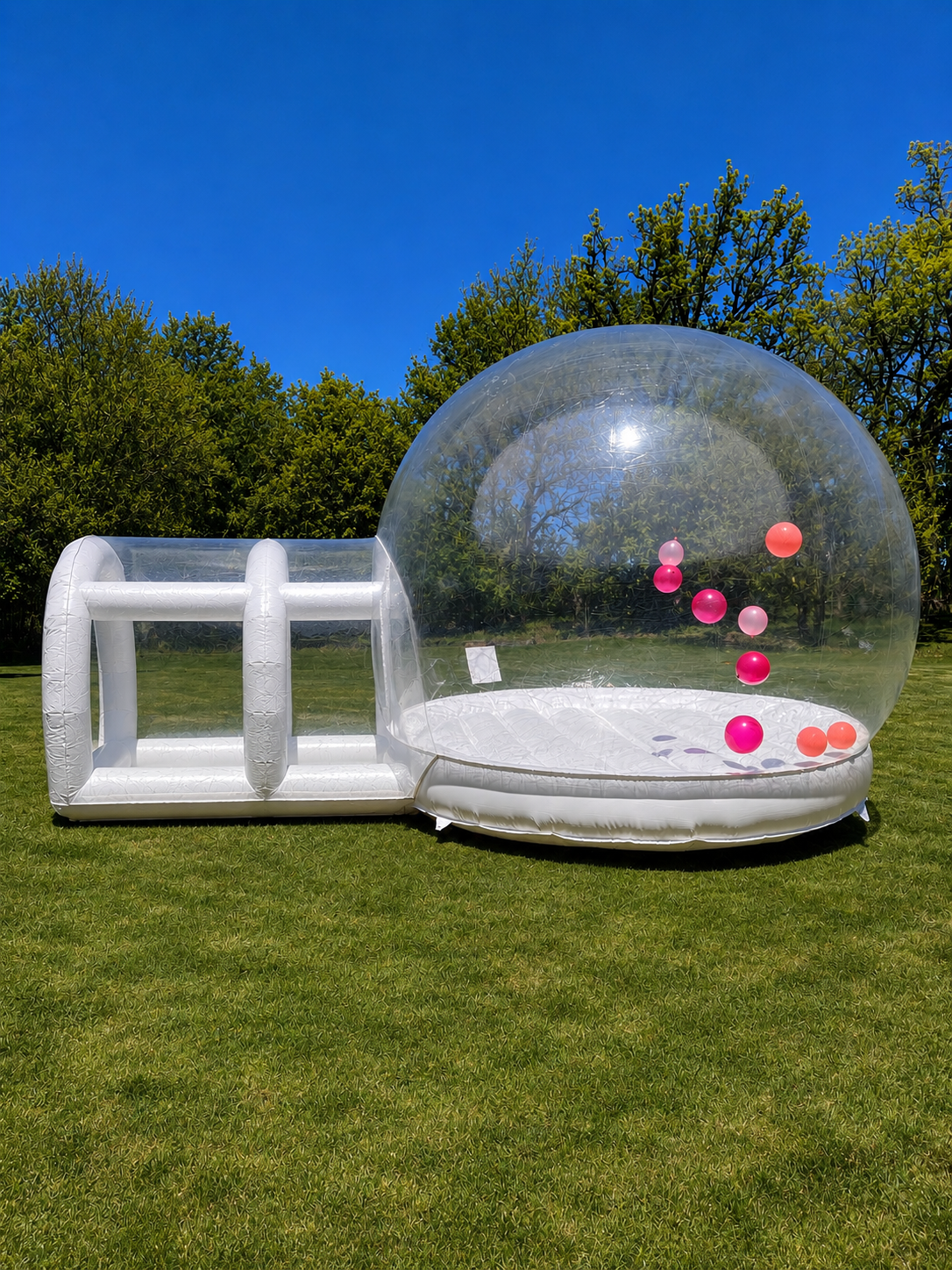 Globe White Bounce House with Pink Balloons Floating in it
