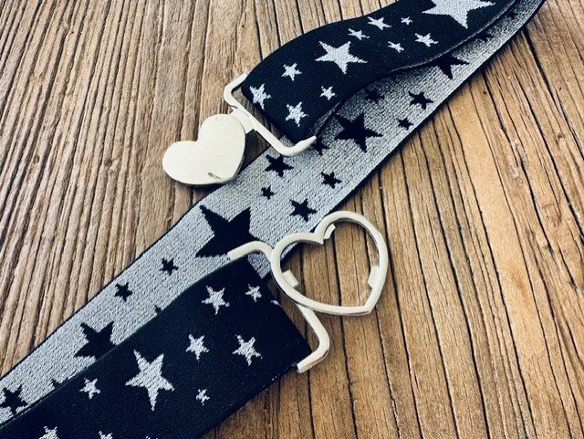 Coastal style women's belt with silver heart clasp and decorative star details