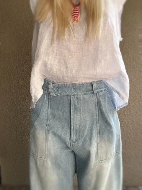 Front waist detail of Banditas Nashi jeans showing high-rise fit