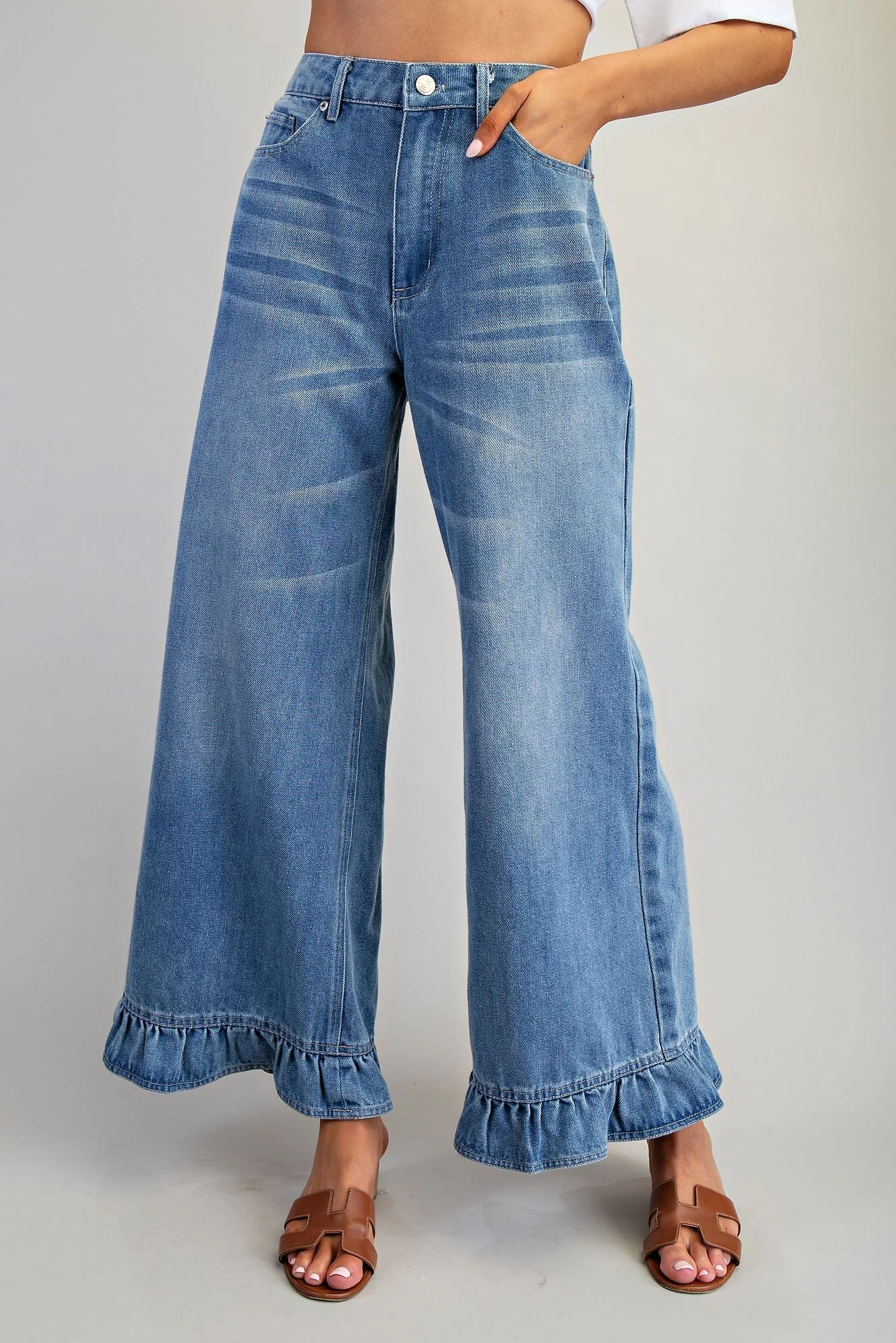 Washed blue wide-leg denim jeans with frill hem