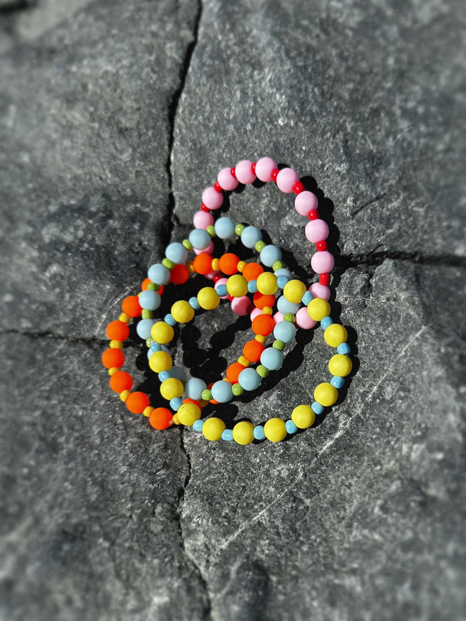 Colorful beaded bracelets in bright playful colors