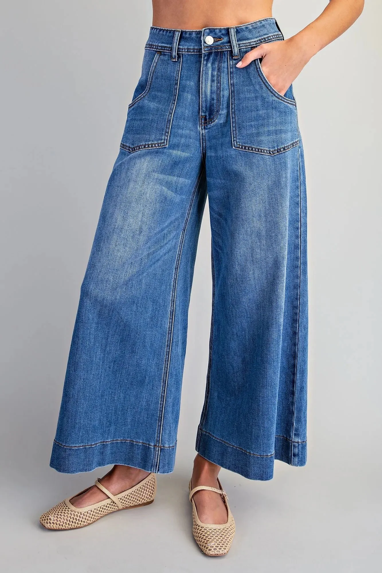 Women's blue crop jeans with a relaxed wide leg fit