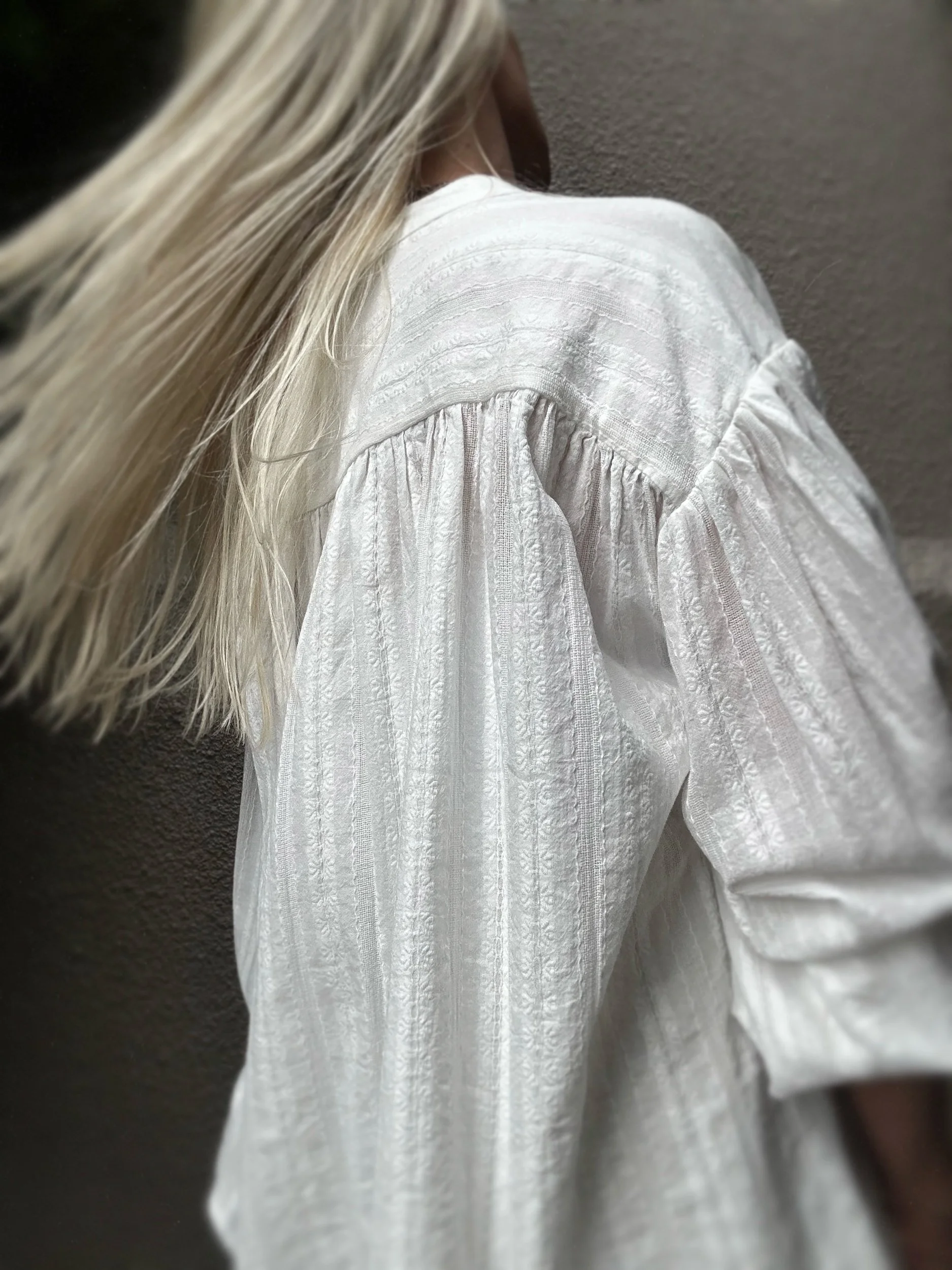 Close-up of the shimmering striped shoulder detail on the Banditas Flegrei shirt