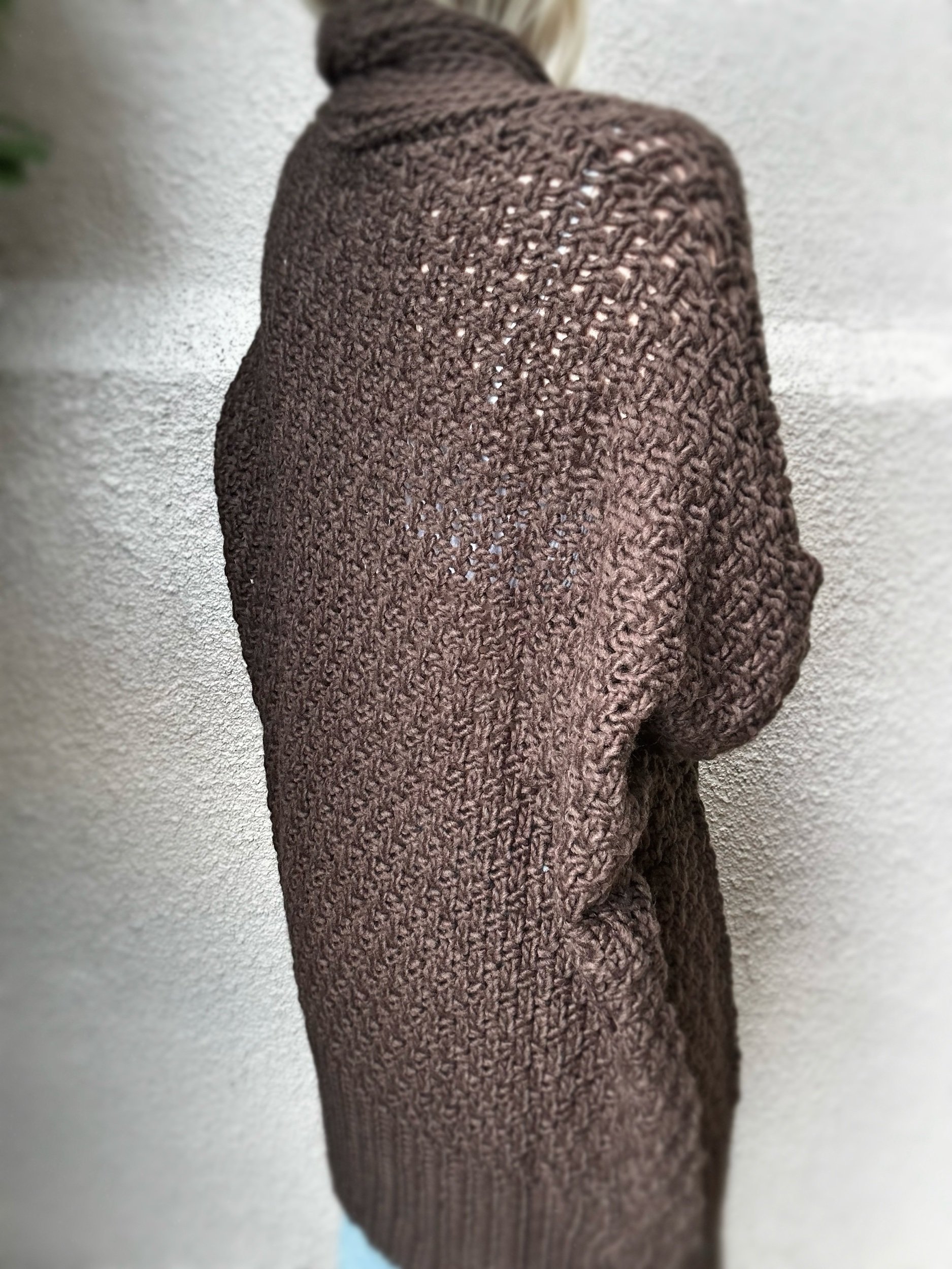 Side view of brown Banditas Honolua Long Cardigan highlighting its textured knit and oversized shape