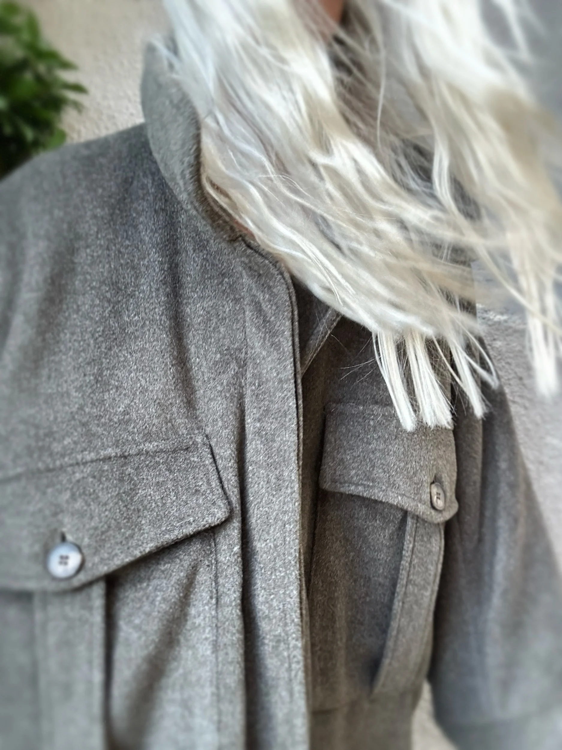 Woman wearing the khaki Banditas Kapalua Jacket with oversized collar and front flap pockets