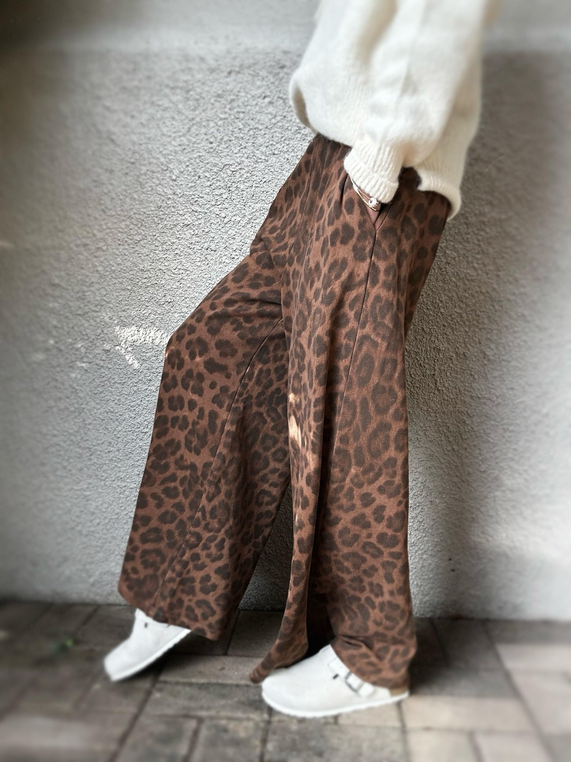 Side view of Banditas Keanae Wide-Leg Joggers showing the relaxed fit and full-length leopard print fabric