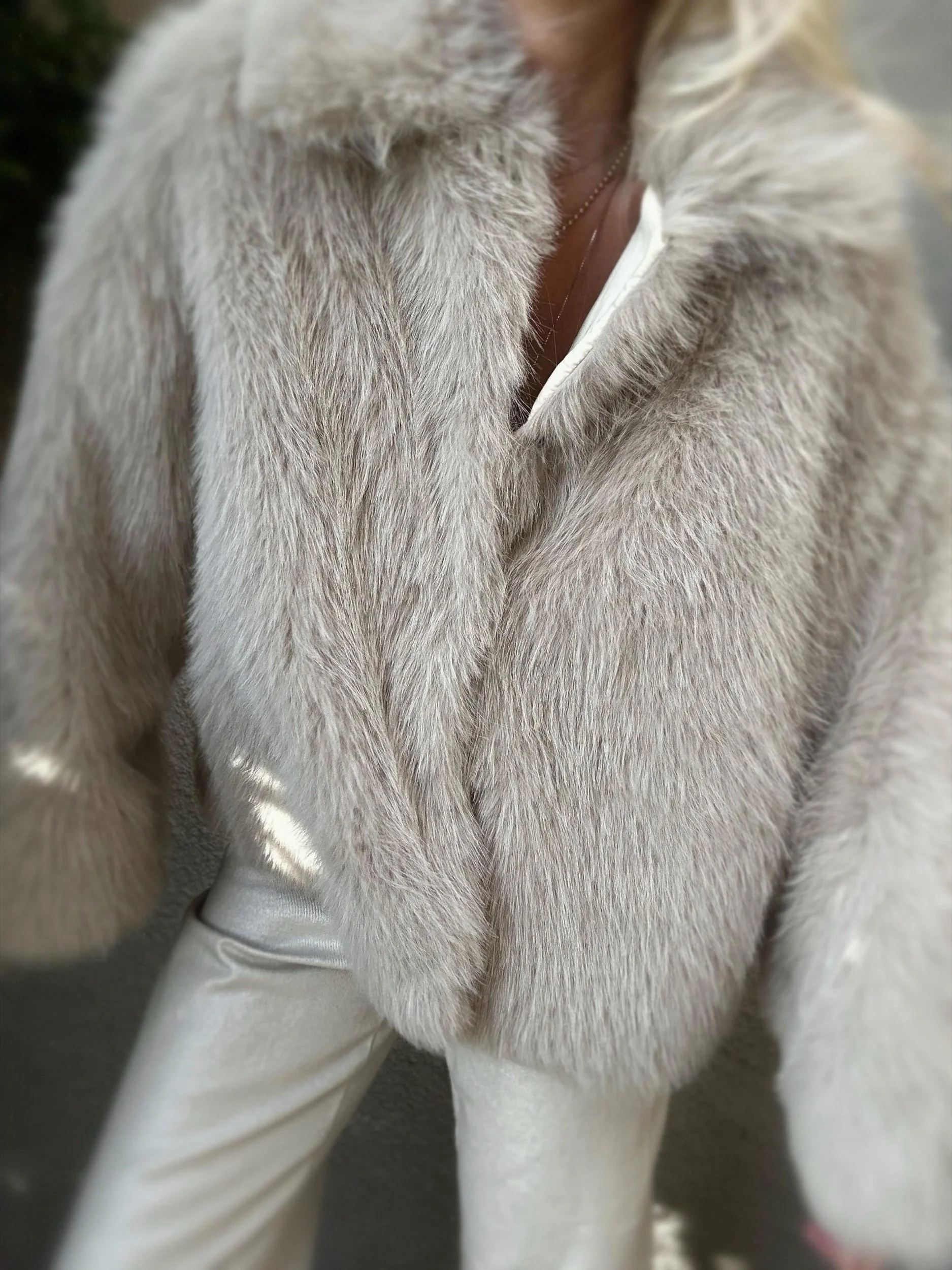 Front view of cream Banditas Makena Faux Fur Jacket showing its fluffy texture and relaxed silhouette