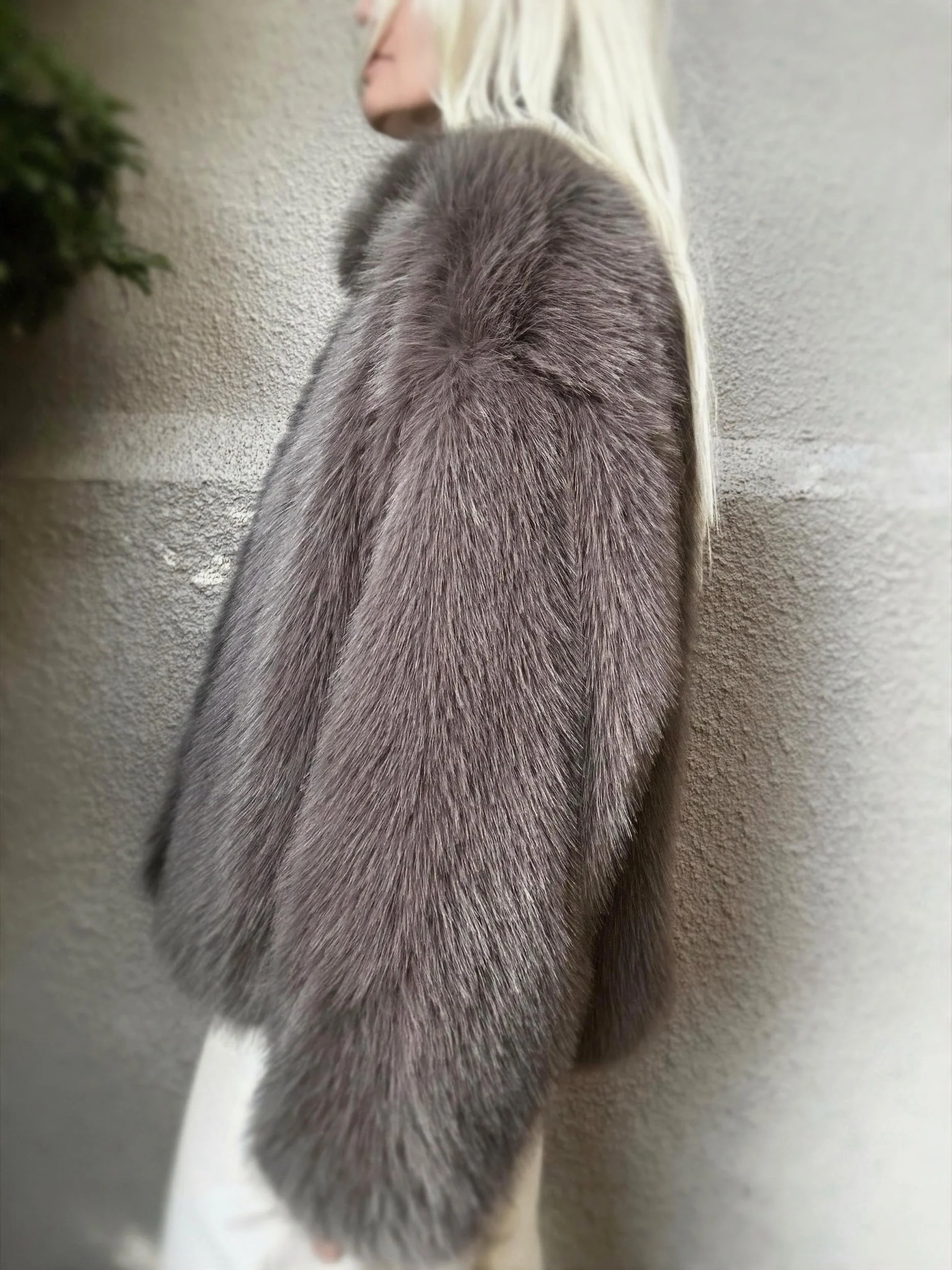 Side view of dark brown Banditas Makena Faux Fur Jacket showing its relaxed shape and plush texture