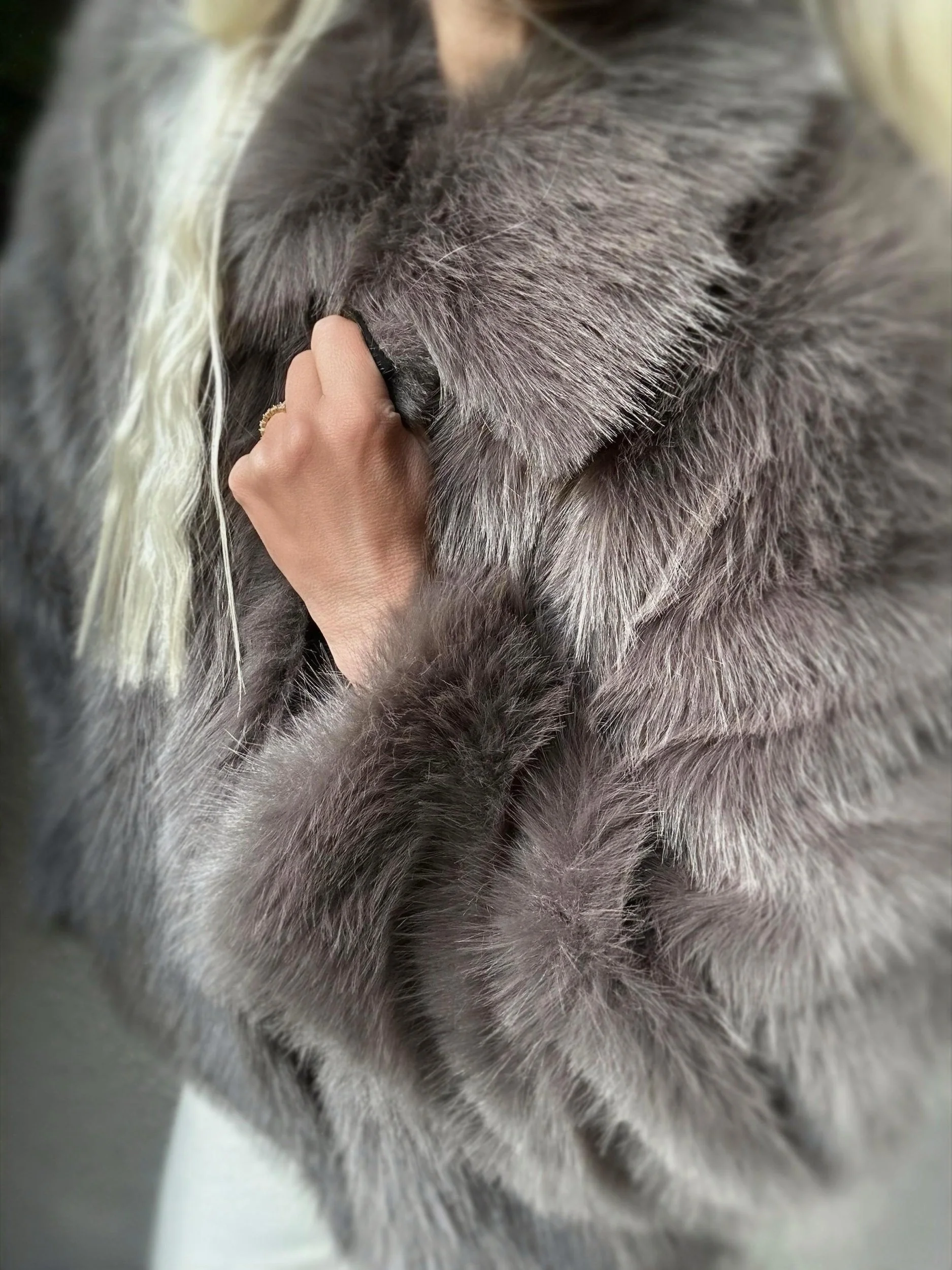 Close-up of dark brown Banditas Makena Faux Fur Jacket showing its plush collar and soft faux fur texture