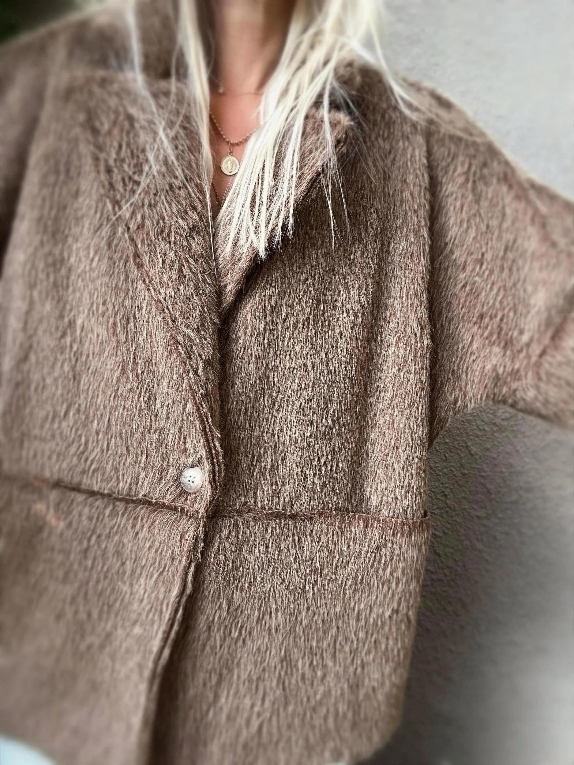 Front view of brown Banditas Napili LOVE Jacket showing its plush texture and open collar